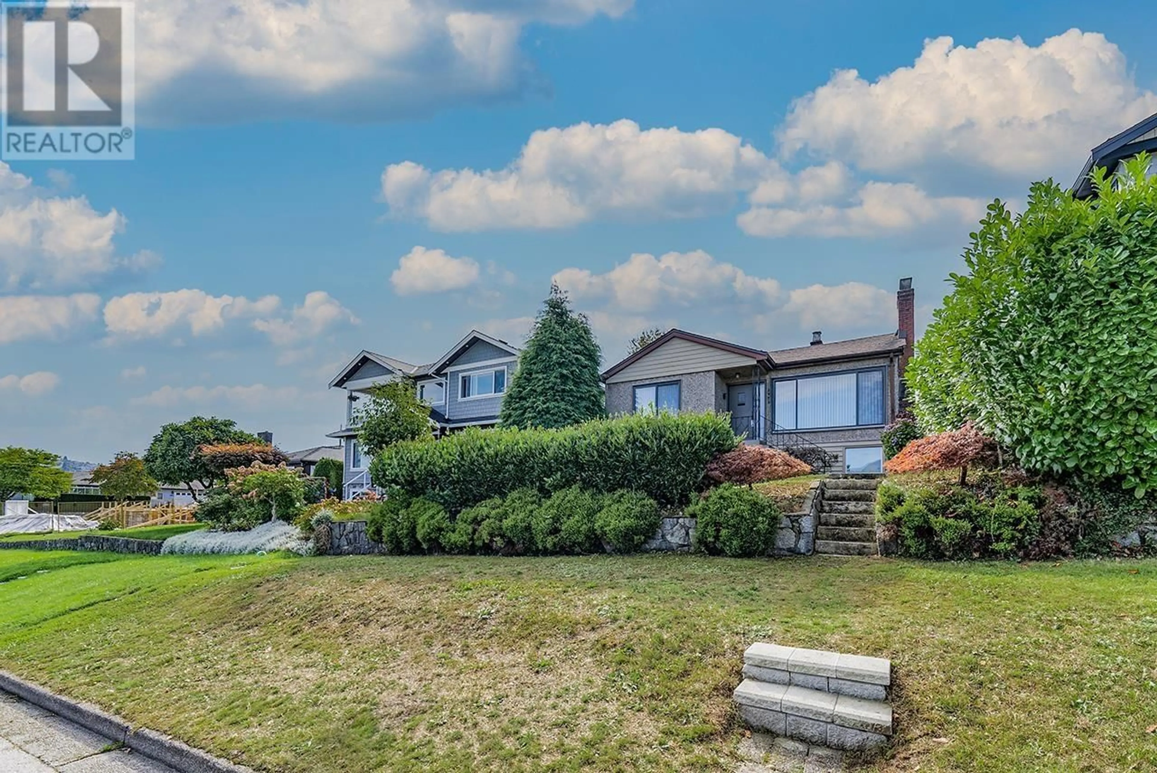 Frontside or backside of a home, the fenced backyard for 3970 EDINBURGH STREET, Burnaby British Columbia V5C1R7