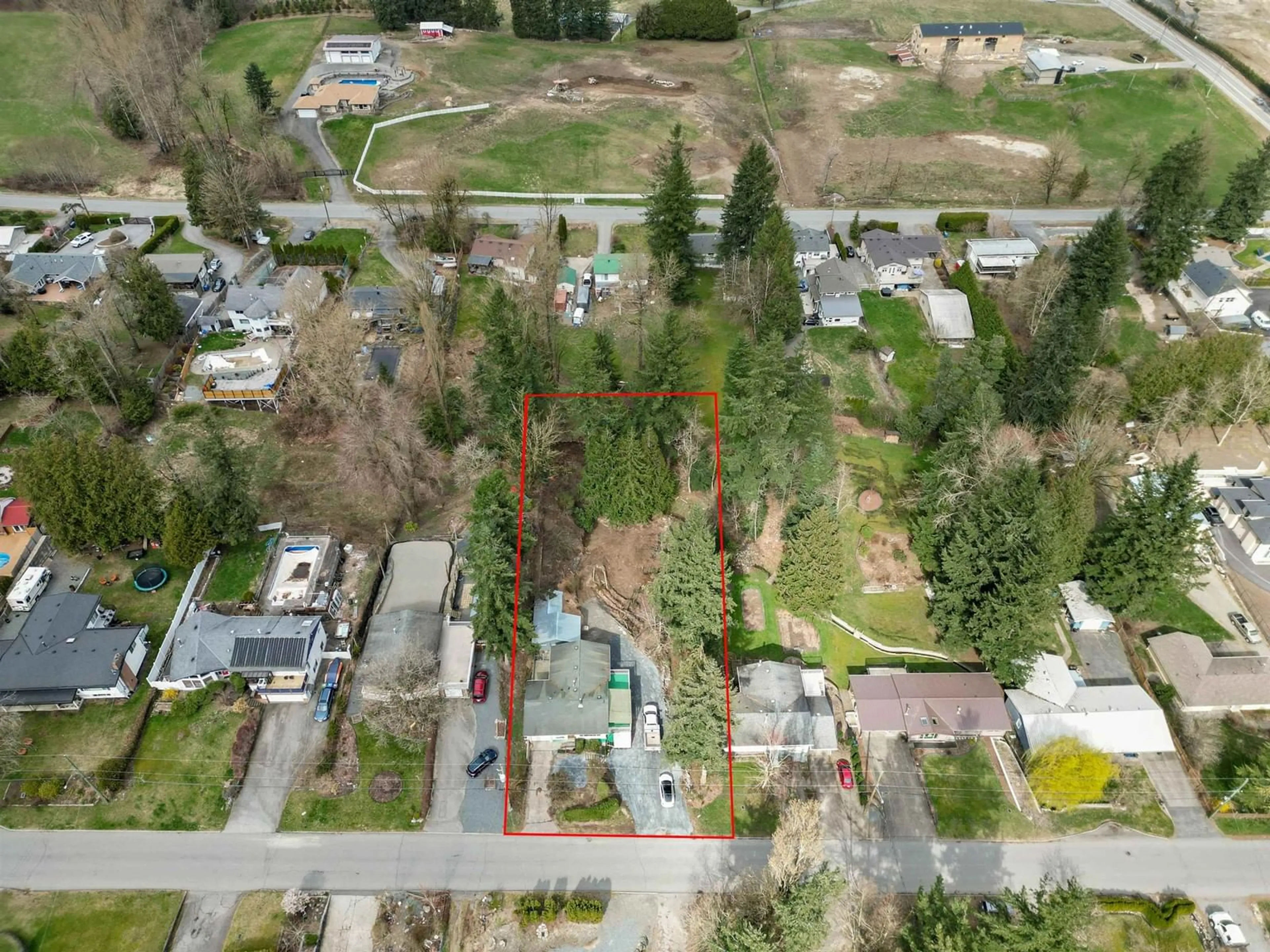 Frontside or backside of a home, the fenced backyard for 29497 SUNVALLEY CRESCENT, Abbotsford British Columbia V4X1J2