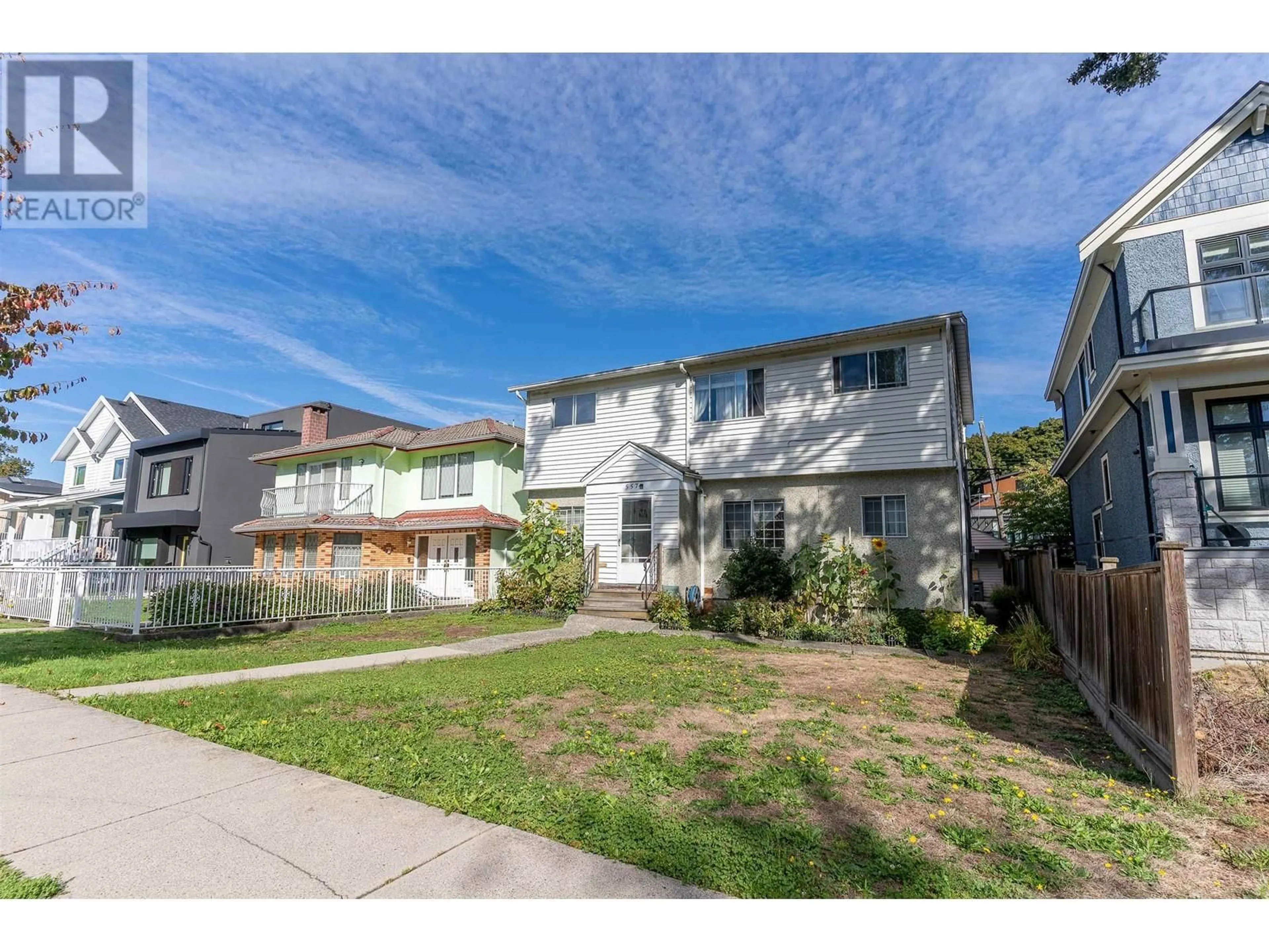 Frontside or backside of a home for 557 E 20TH AVENUE, Vancouver British Columbia V5V1M7