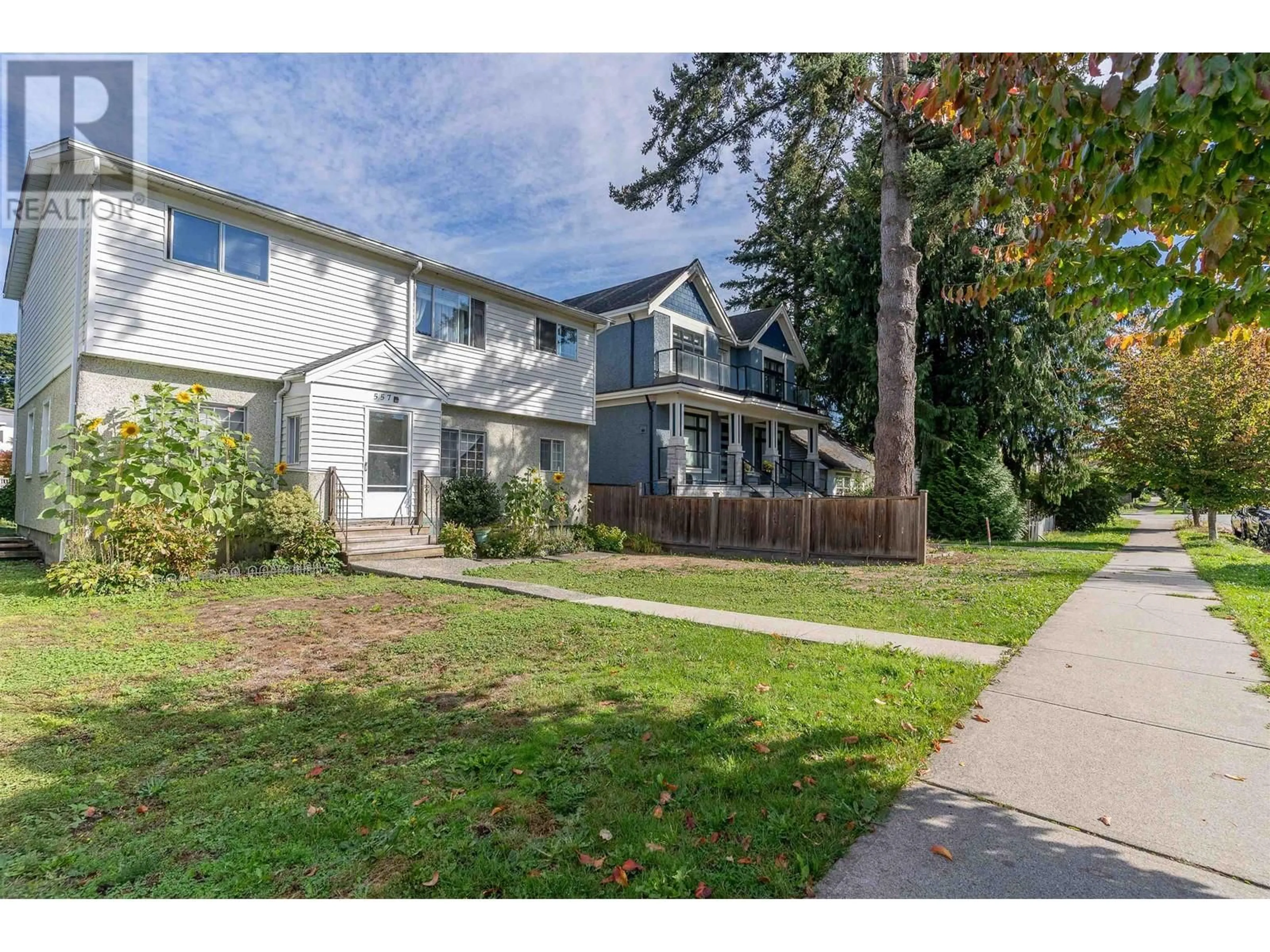 A pic from exterior of the house or condo, the fenced backyard for 557 E 20TH AVENUE, Vancouver British Columbia V5V1M7