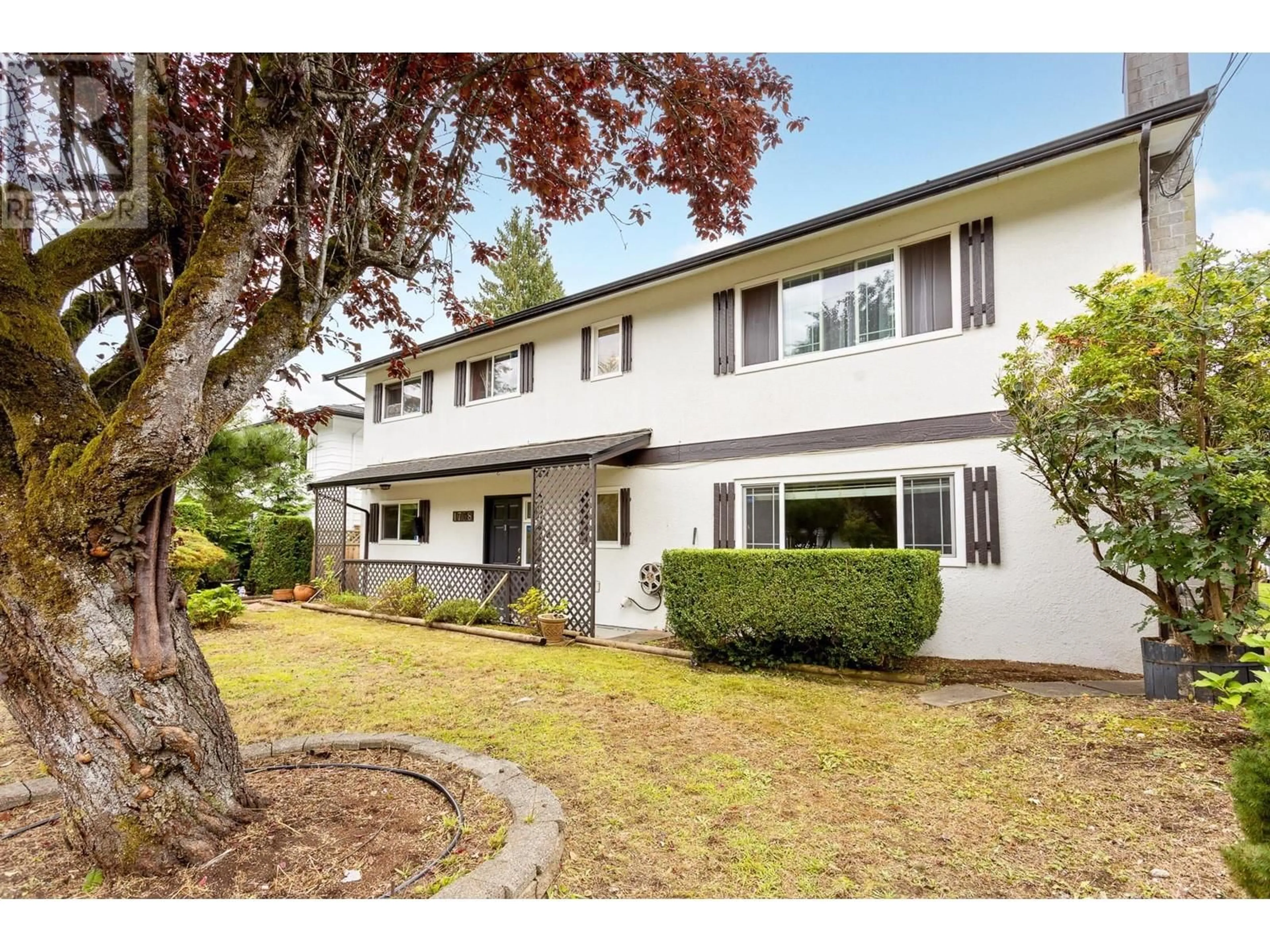 Frontside or backside of a home for 1738 JENSEN AVENUE, Port Coquitlam British Columbia V3B2E3