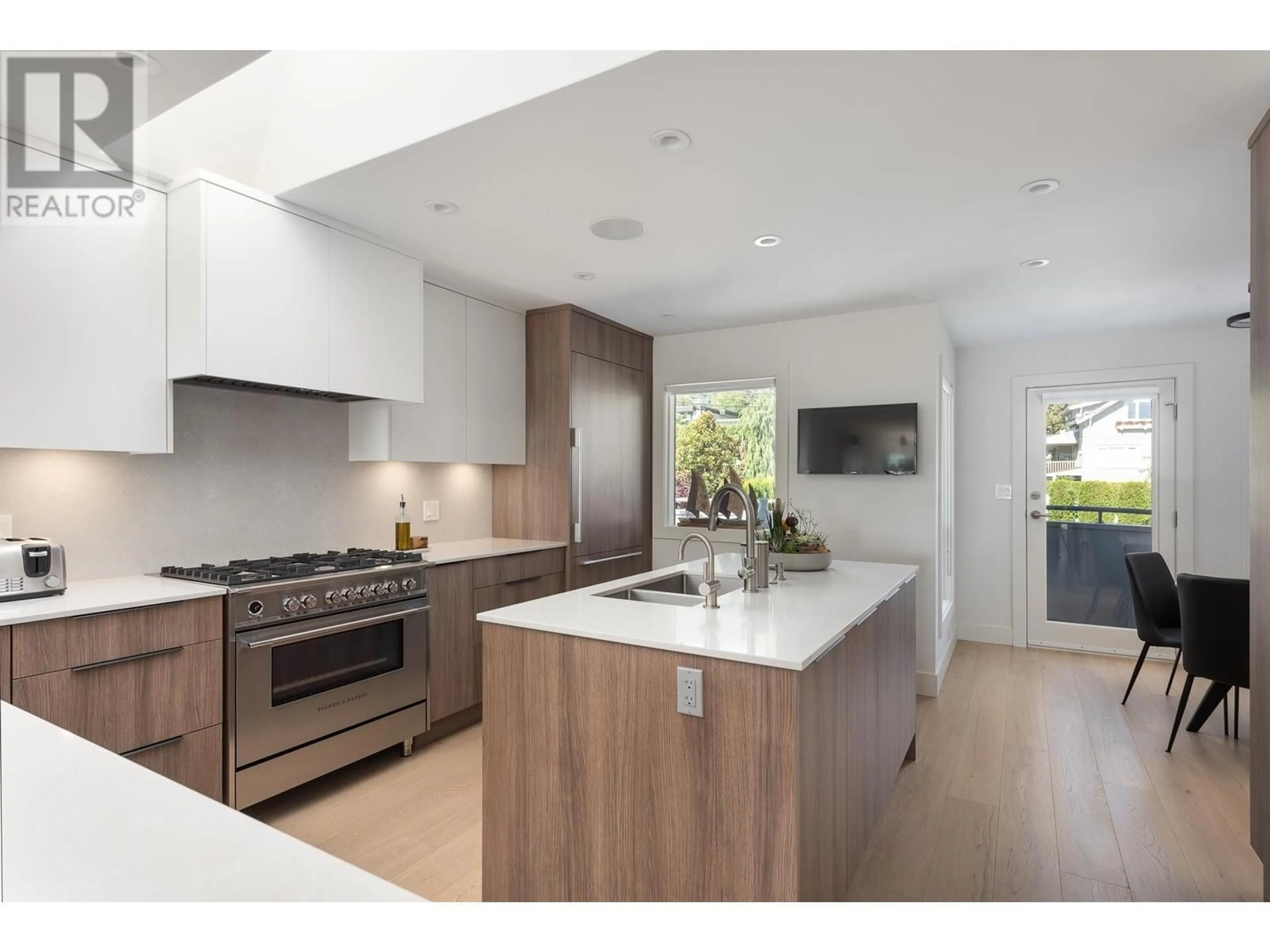 Contemporary kitchen, wood floors for 2526 MARINE DRIVE, West Vancouver British Columbia V7V1L4