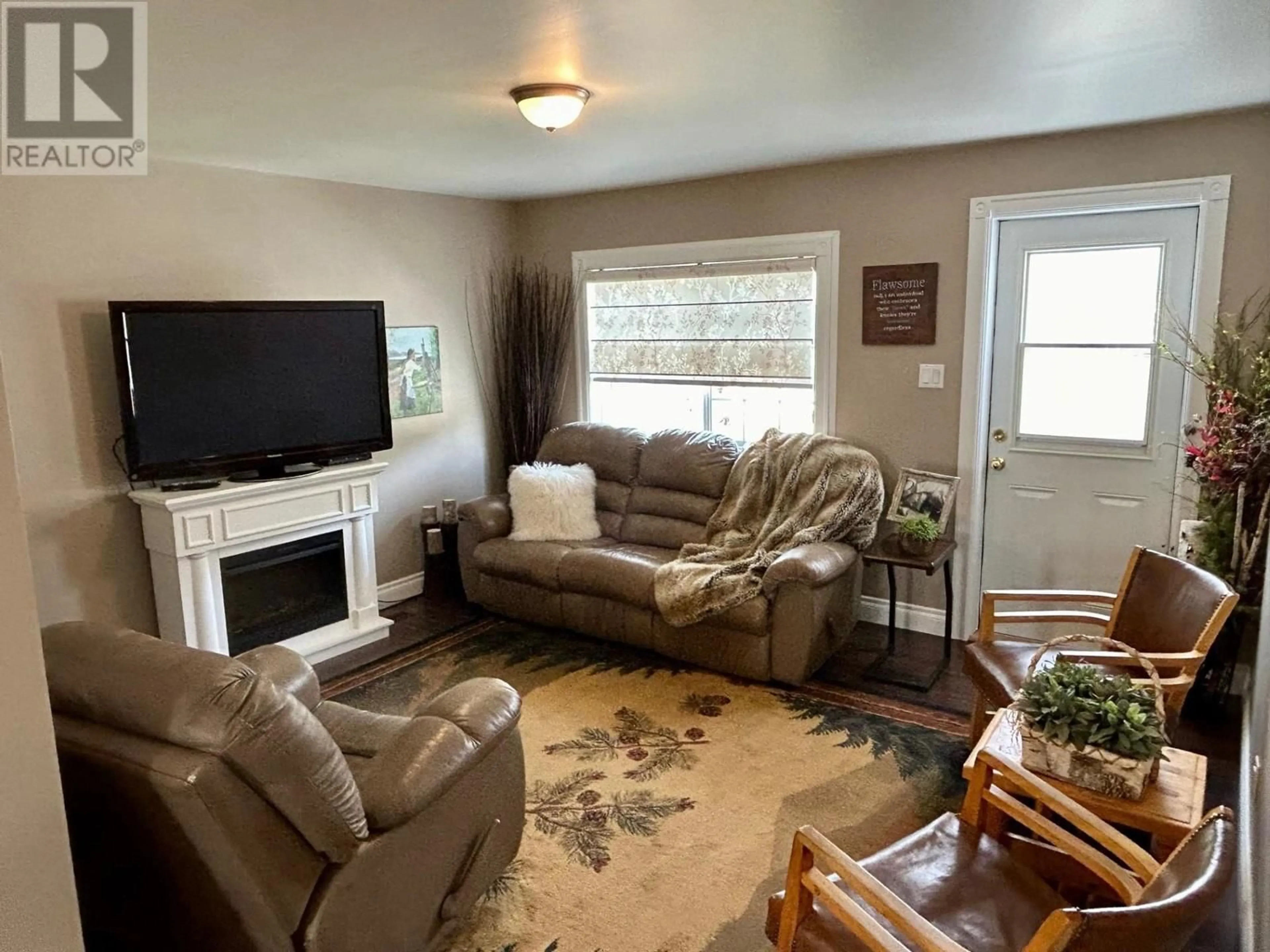 A pic of a room, wood floors for 5604 49 STREET, Fort Nelson British Columbia V0C1R0