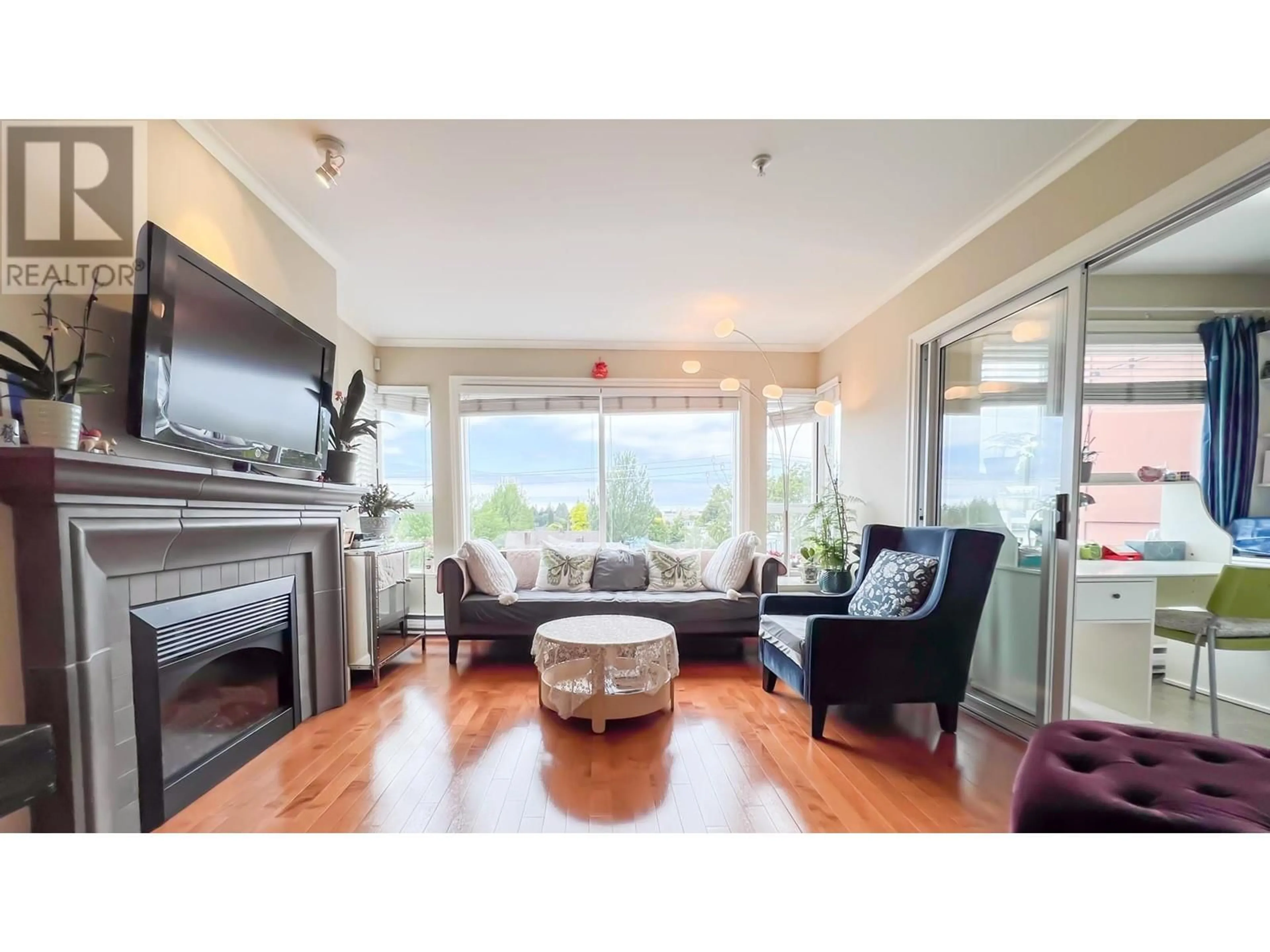 Living room, wood floors for 406 2103 W 45TH AVENUE, Vancouver British Columbia V6M2J2