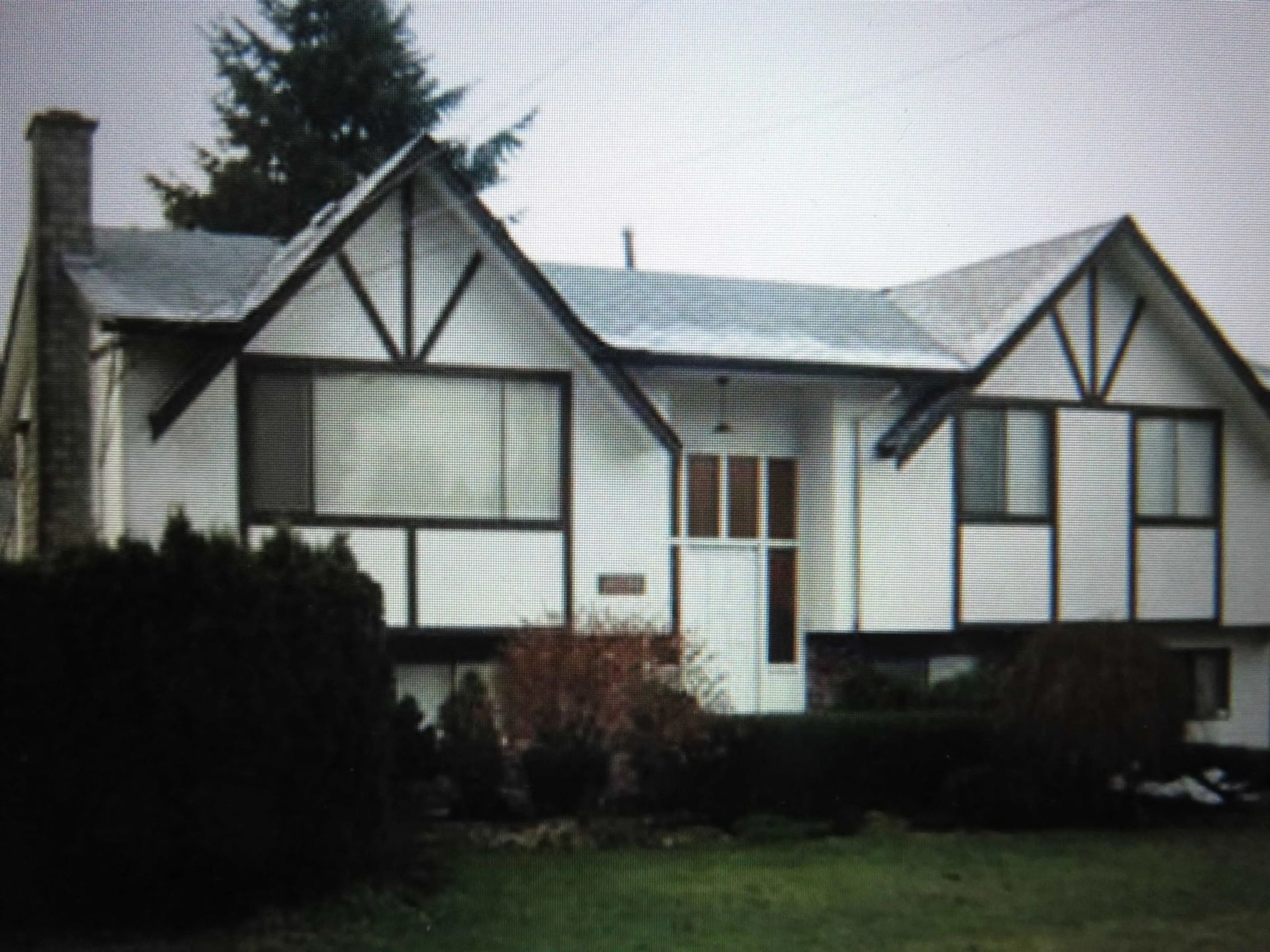 Home with vinyl exterior material, street for 14086 103A, Surrey British Columbia V3T5A3