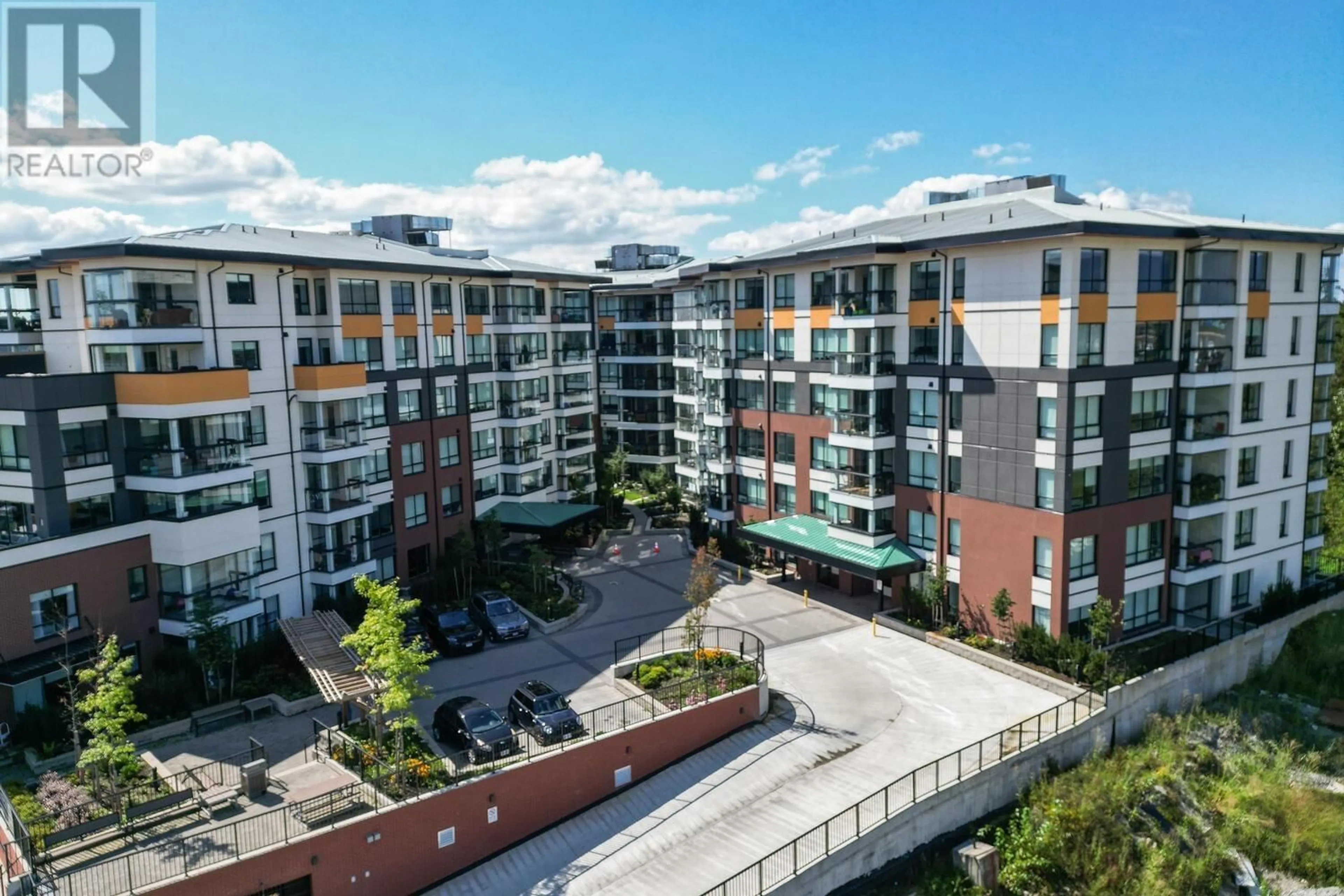 A pic from exterior of the house or condo, the view of city buildings for 310 11641 227 STREET, Maple Ridge British Columbia V2X9J6