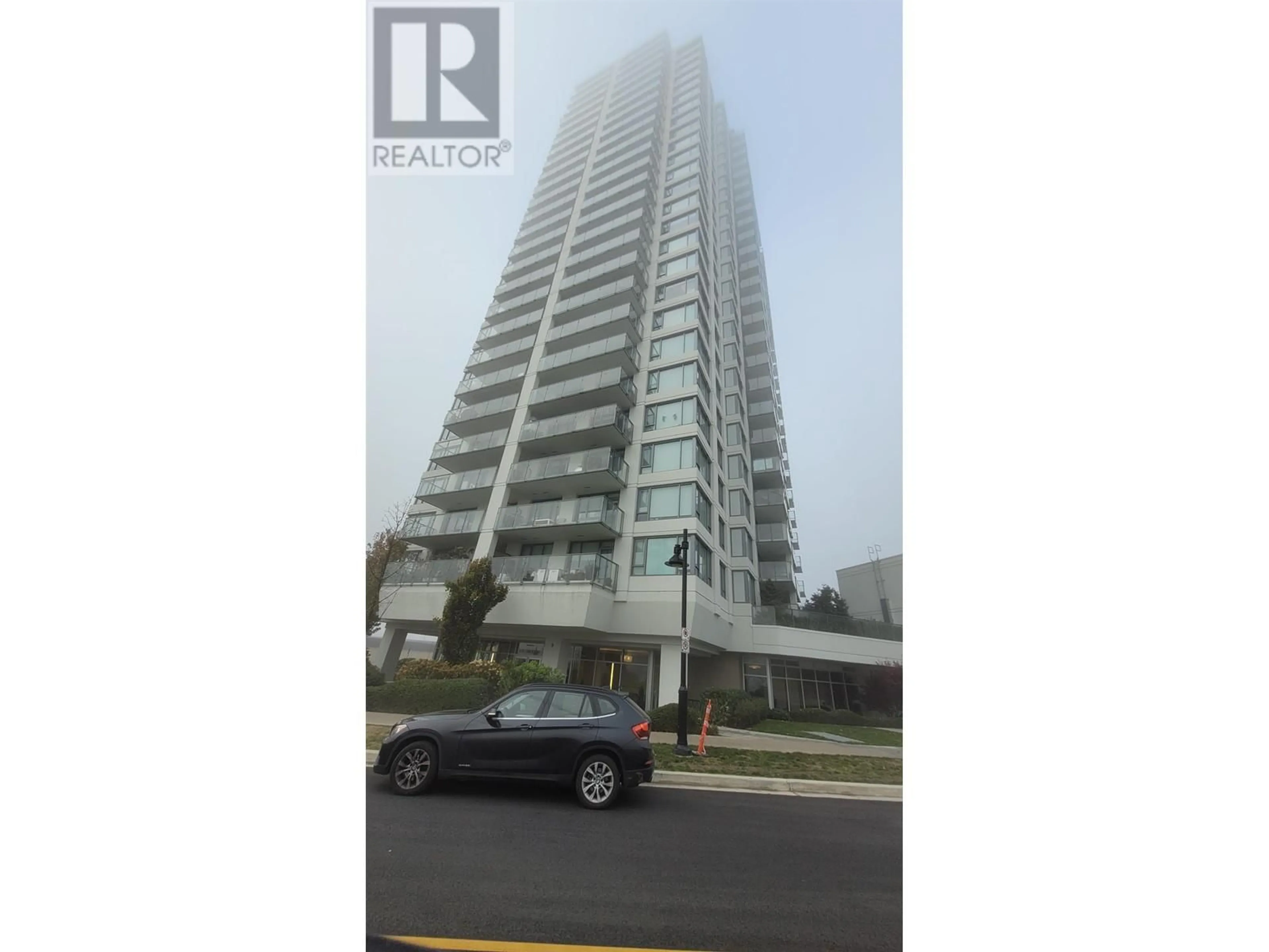 A pic from exterior of the house or condo, the street view for 303 570 EMERSON STREET, Coquitlam British Columbia V3J0G3