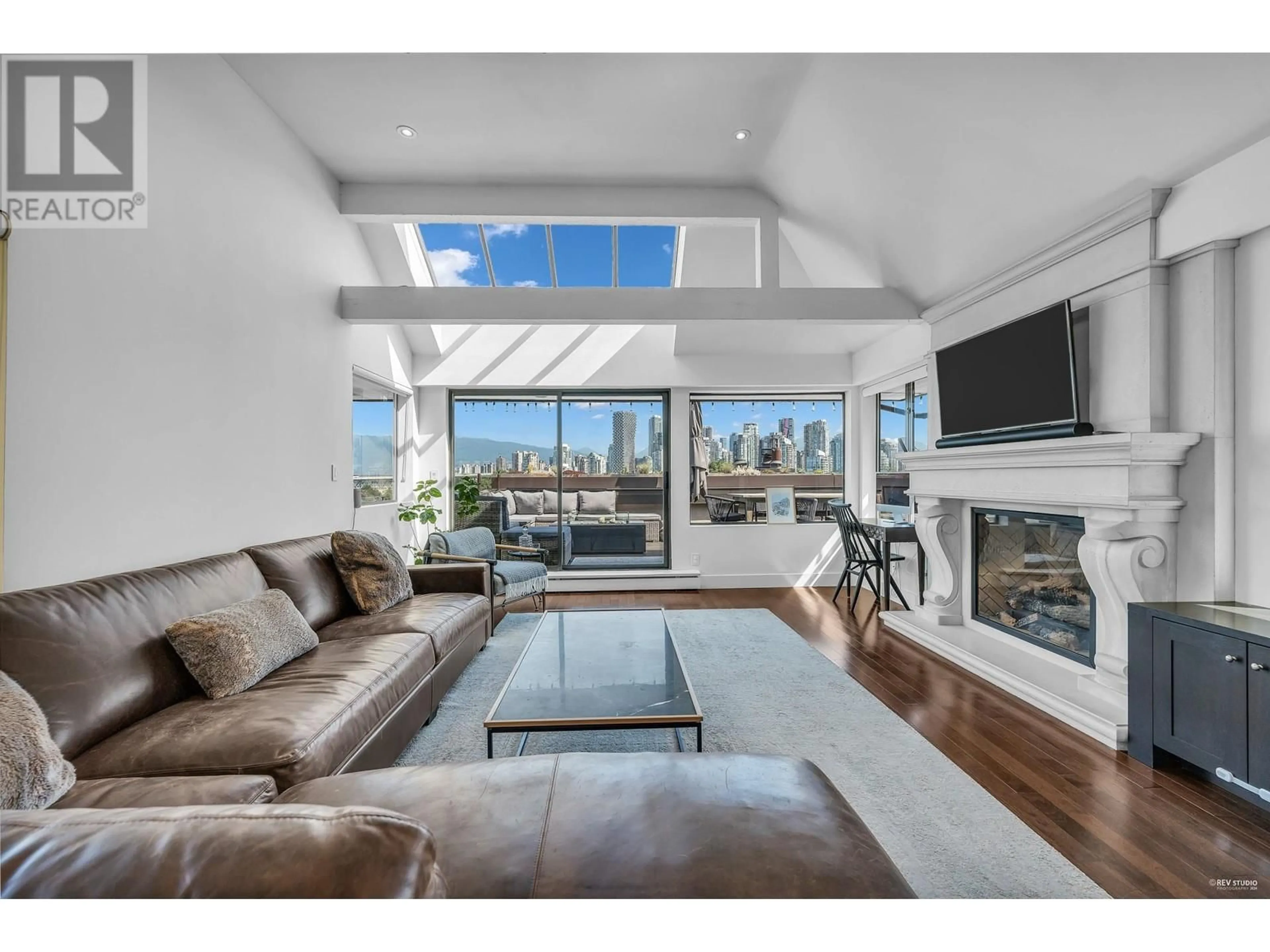 Living room, wood floors for 1205 W 7TH AVENUE, Vancouver British Columbia V6H1B7