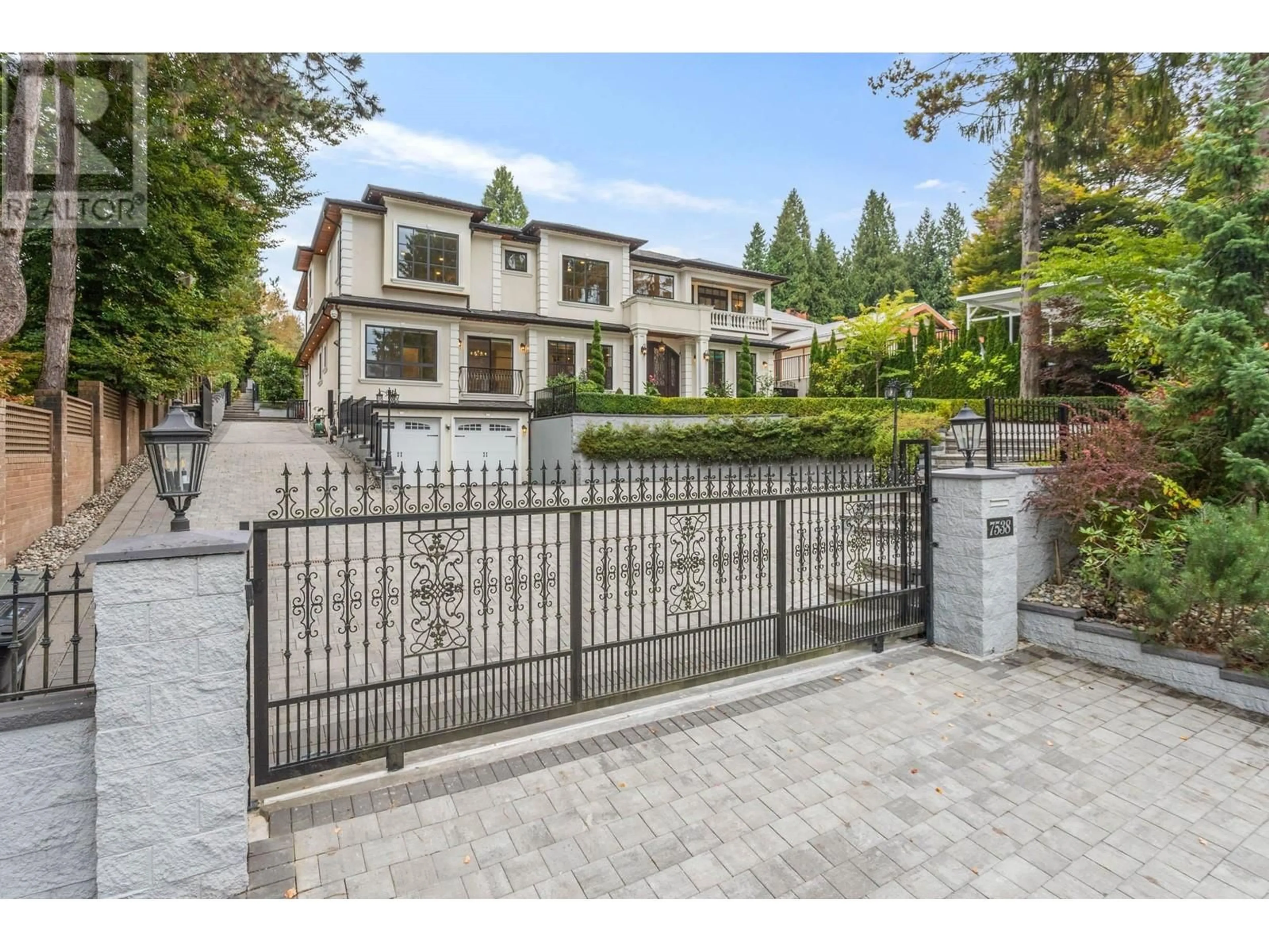 Frontside or backside of a home, the fenced backyard for 7538 BURRIS STREET, Burnaby British Columbia V5E1Y9