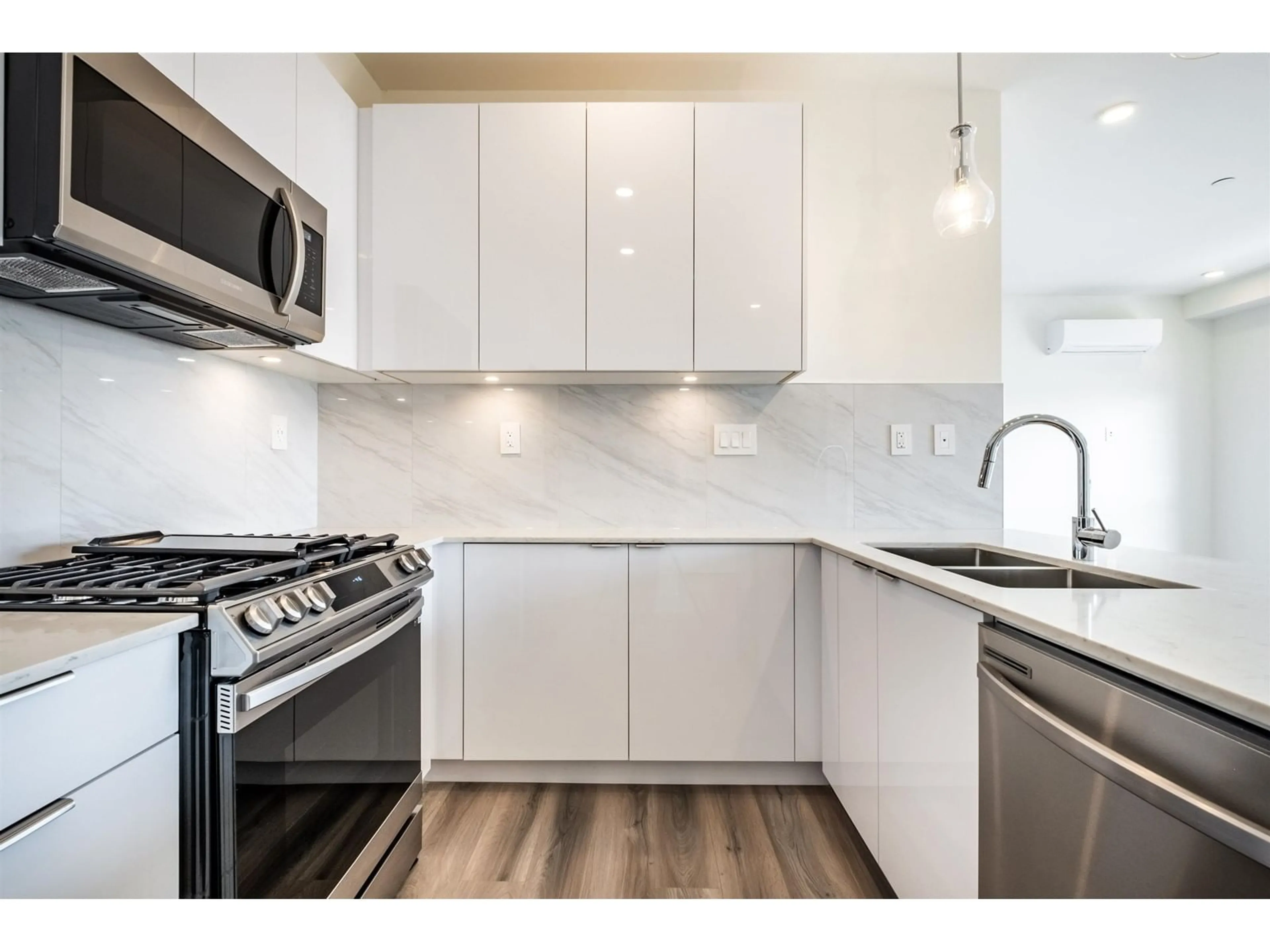 Standard kitchen, wood floors for A212 8447 202 STREET, Langley British Columbia V2Y4K1