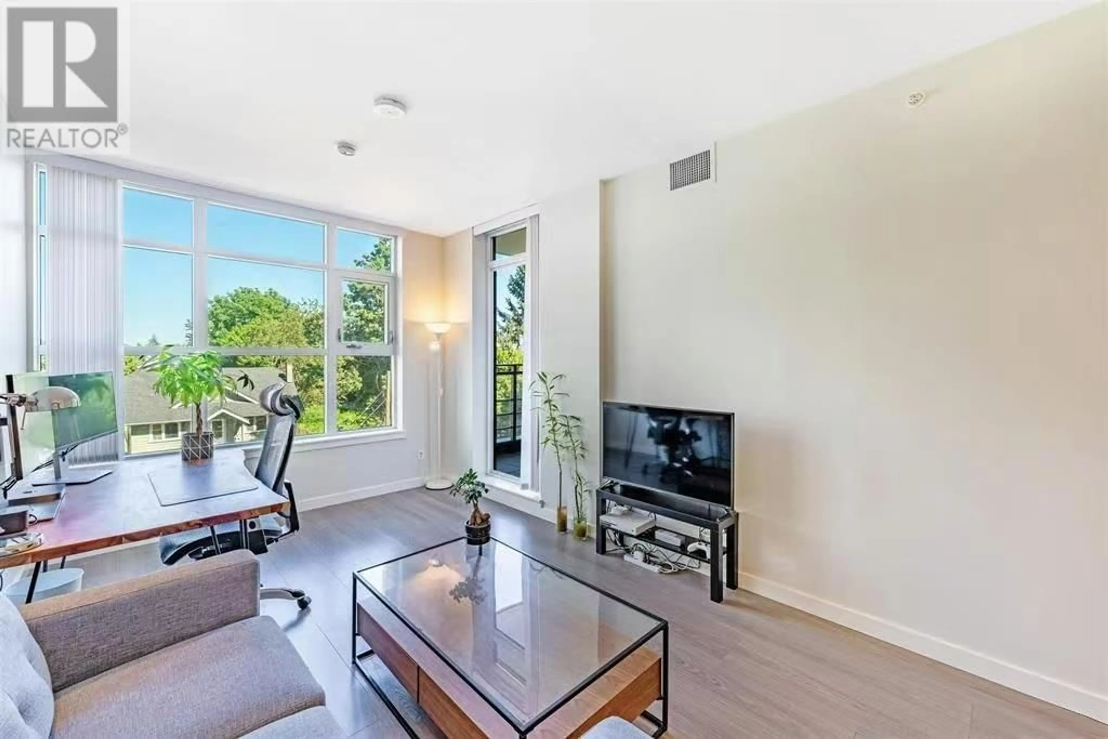 Living room, wood floors for 308 3333 SEXSMITH ROAD, Richmond British Columbia V6X0R7