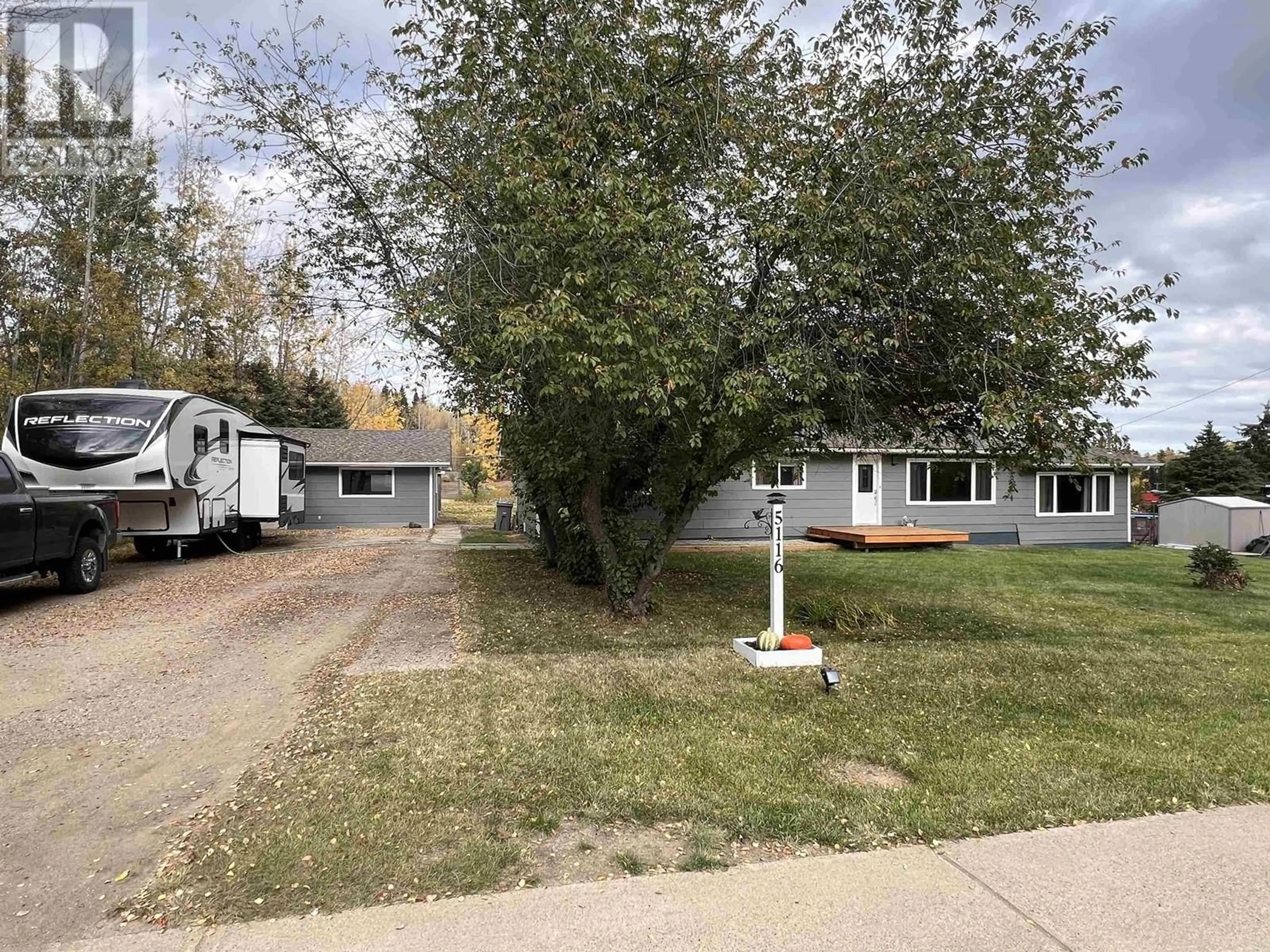 A pic from outside/outdoor area/front of a property/back of a property/a pic from drone, street for 5116 SUNSET DRIVE, Fort Nelson British Columbia V0C1R0
