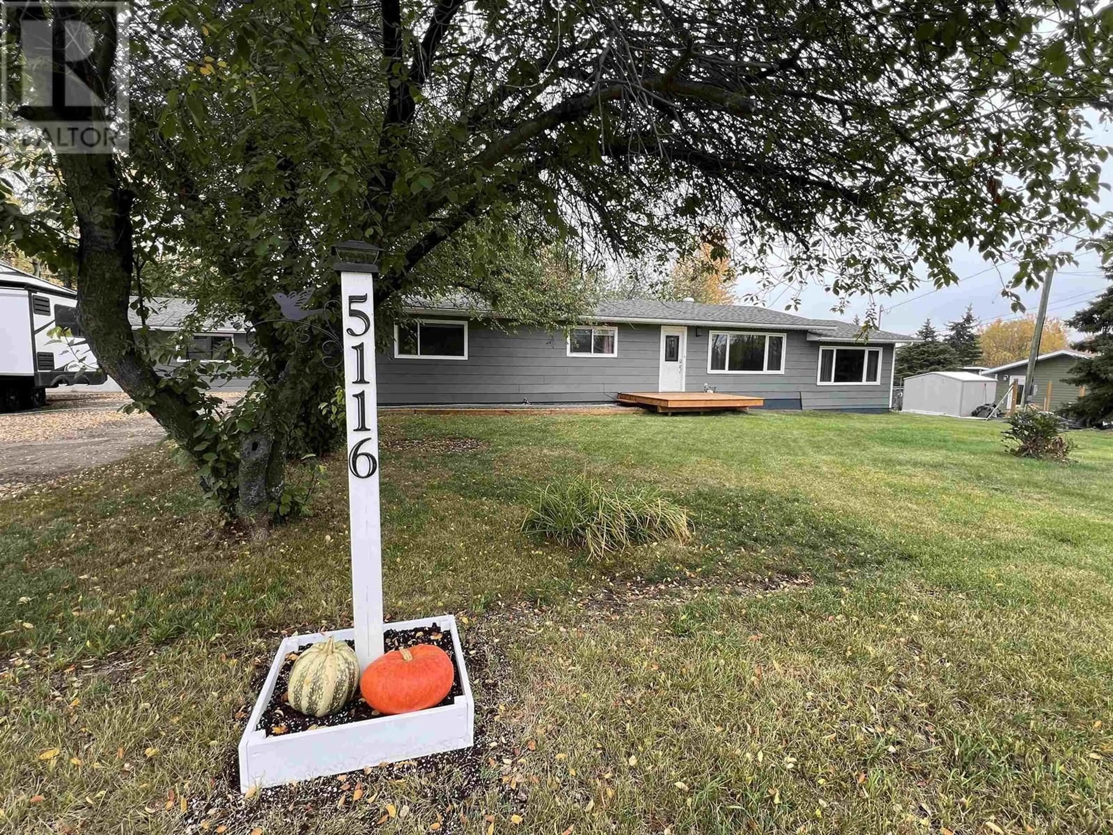 A pic from outside/outdoor area/front of a property/back of a property/a pic from drone, street for 5116 SUNSET DRIVE, Fort Nelson British Columbia V0C1R0