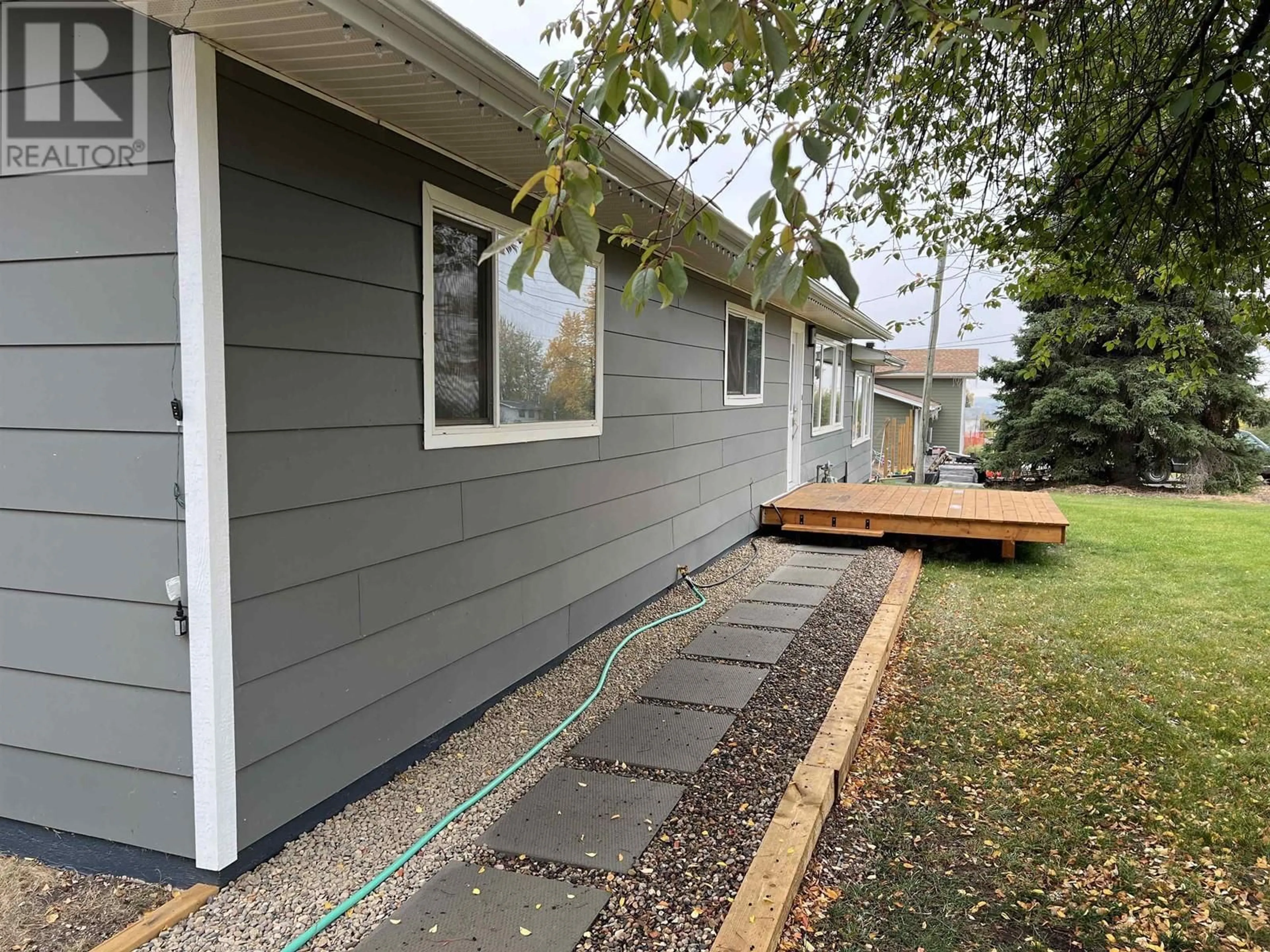 Home with vinyl exterior material, street for 5116 SUNSET DRIVE, Fort Nelson British Columbia V0C1R0
