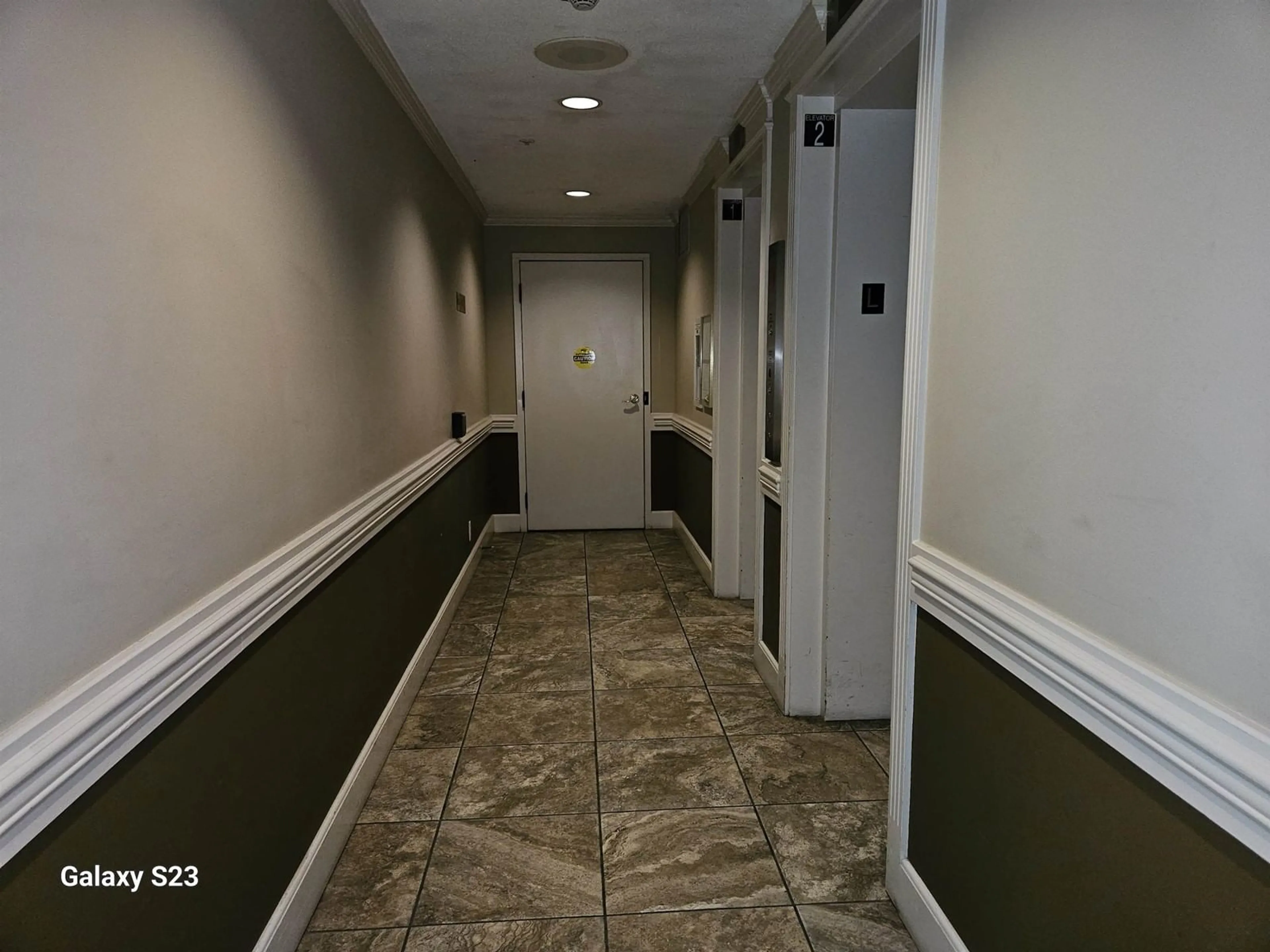 Indoor foyer, not visible floor for 1401 3170 GLADWIN ROAD, Abbotsford British Columbia V2T5T1