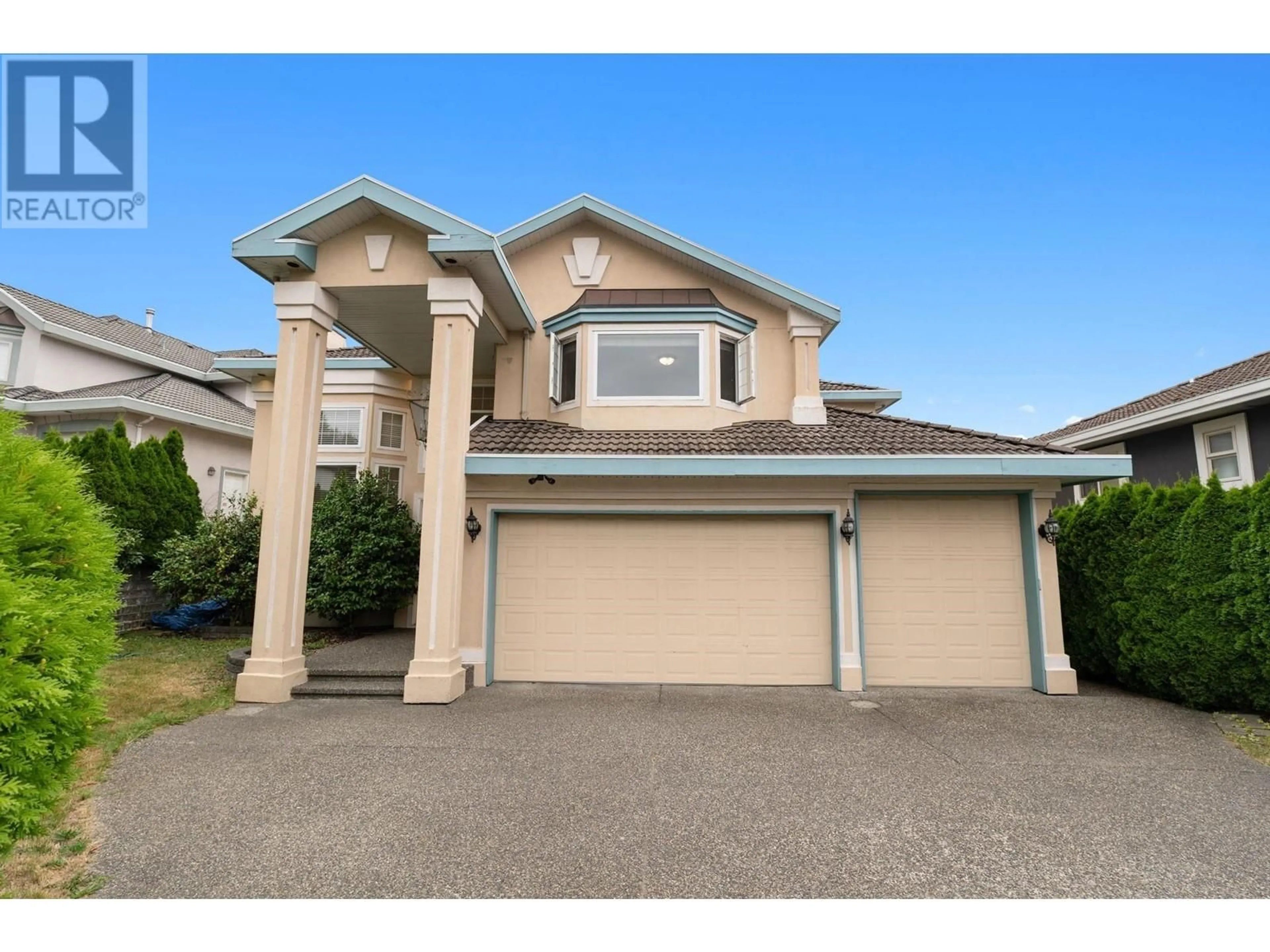 Frontside or backside of a home, the street view for 1569 PINETREE WAY, Coquitlam British Columbia V3E3B5