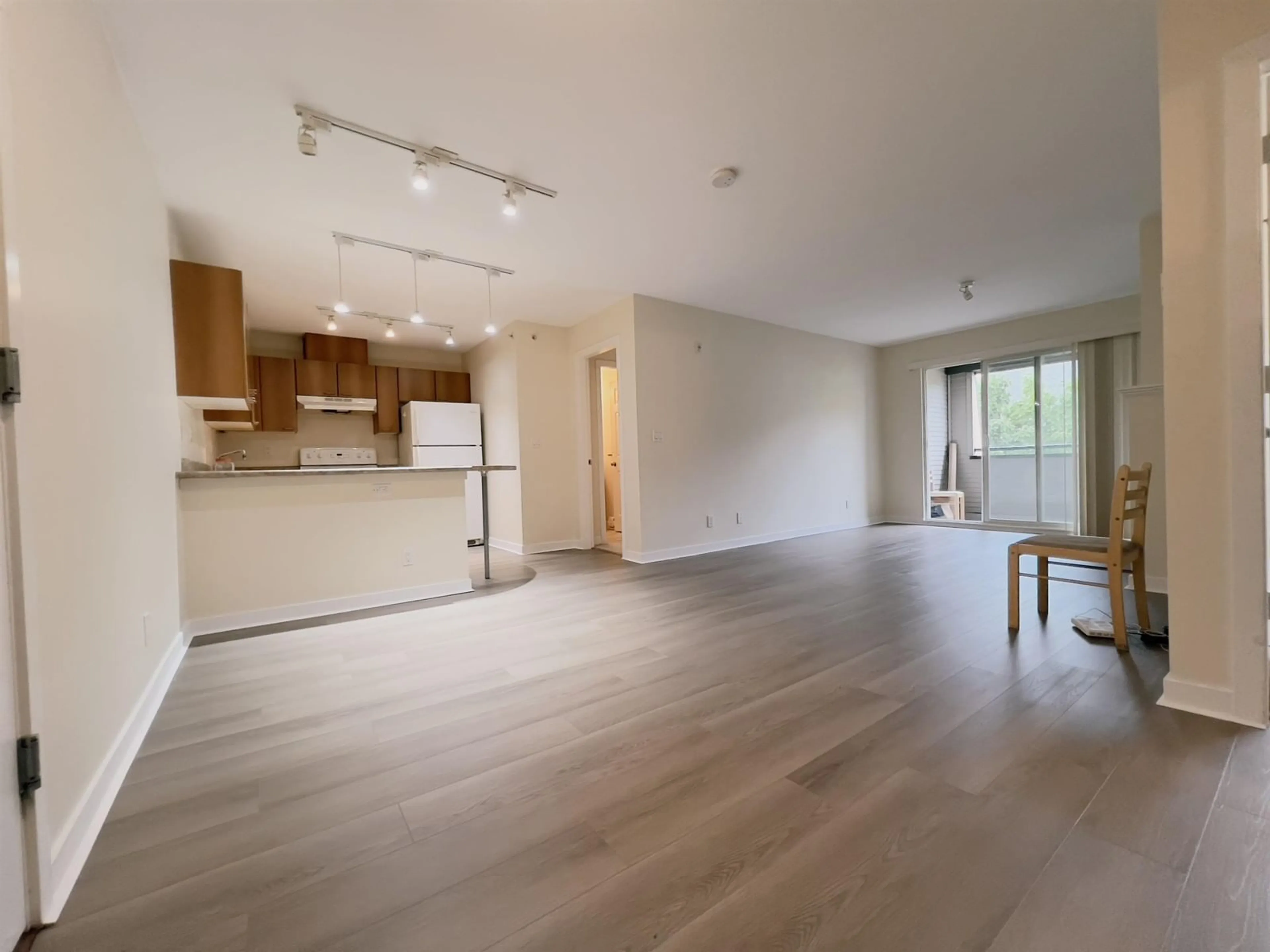 A pic of a room, wood floors for 421 12083 92A AVENUE, Surrey British Columbia V3V8C8