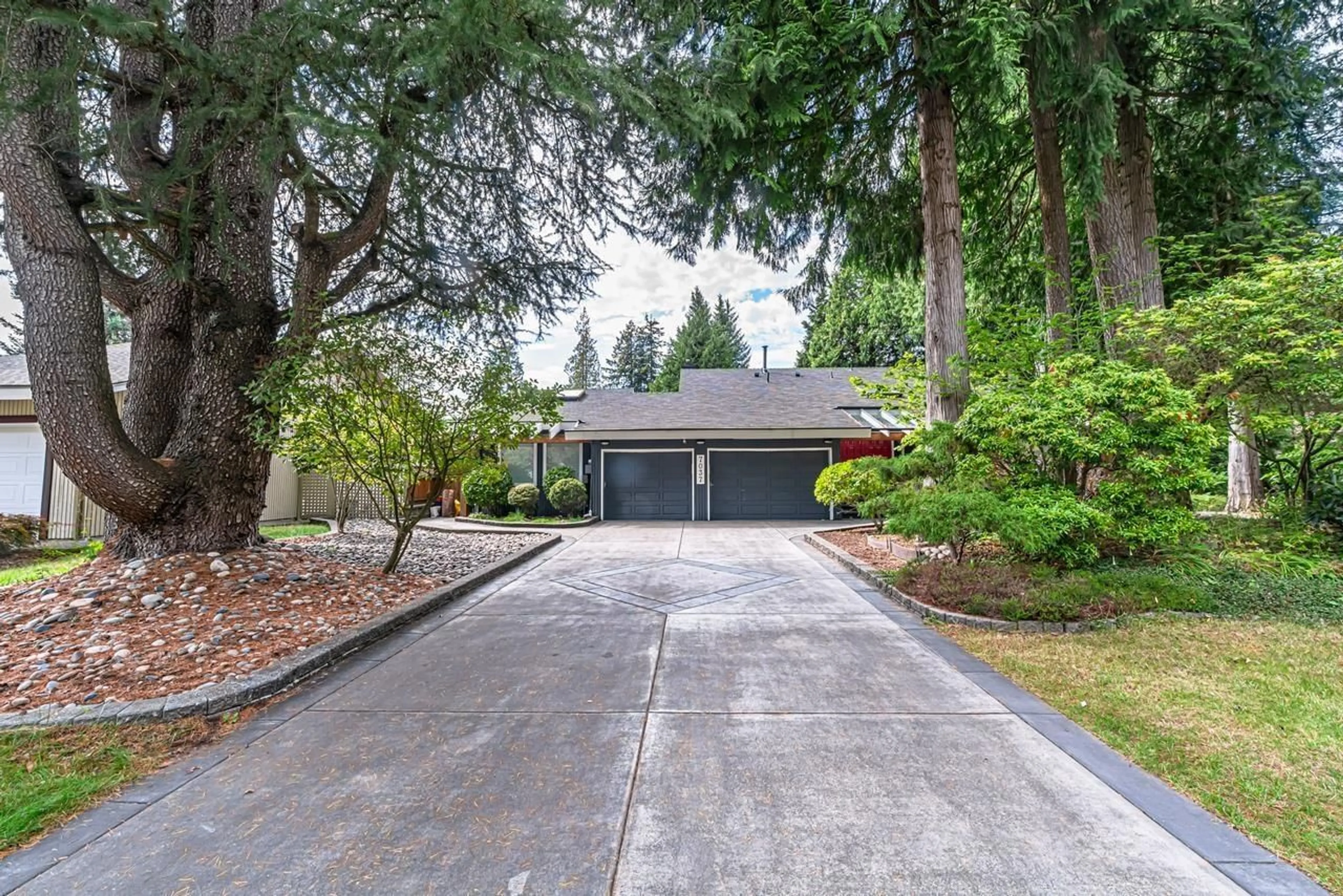 Frontside or backside of a home, the street view for 7037 WOODCREST PLACE, Delta British Columbia V4E2P2