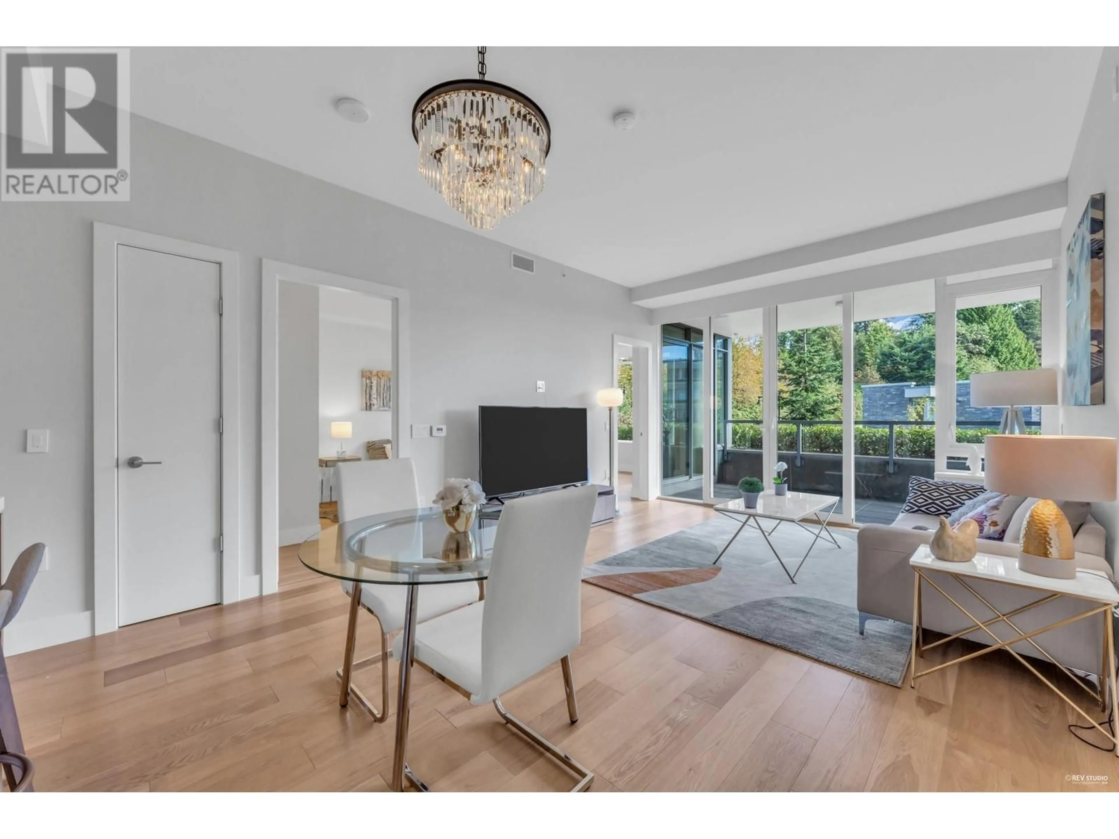 A pic of a room, wood floors for 401 866 ARTHUR ERICKSON PLACE, West Vancouver British Columbia V7T0B2