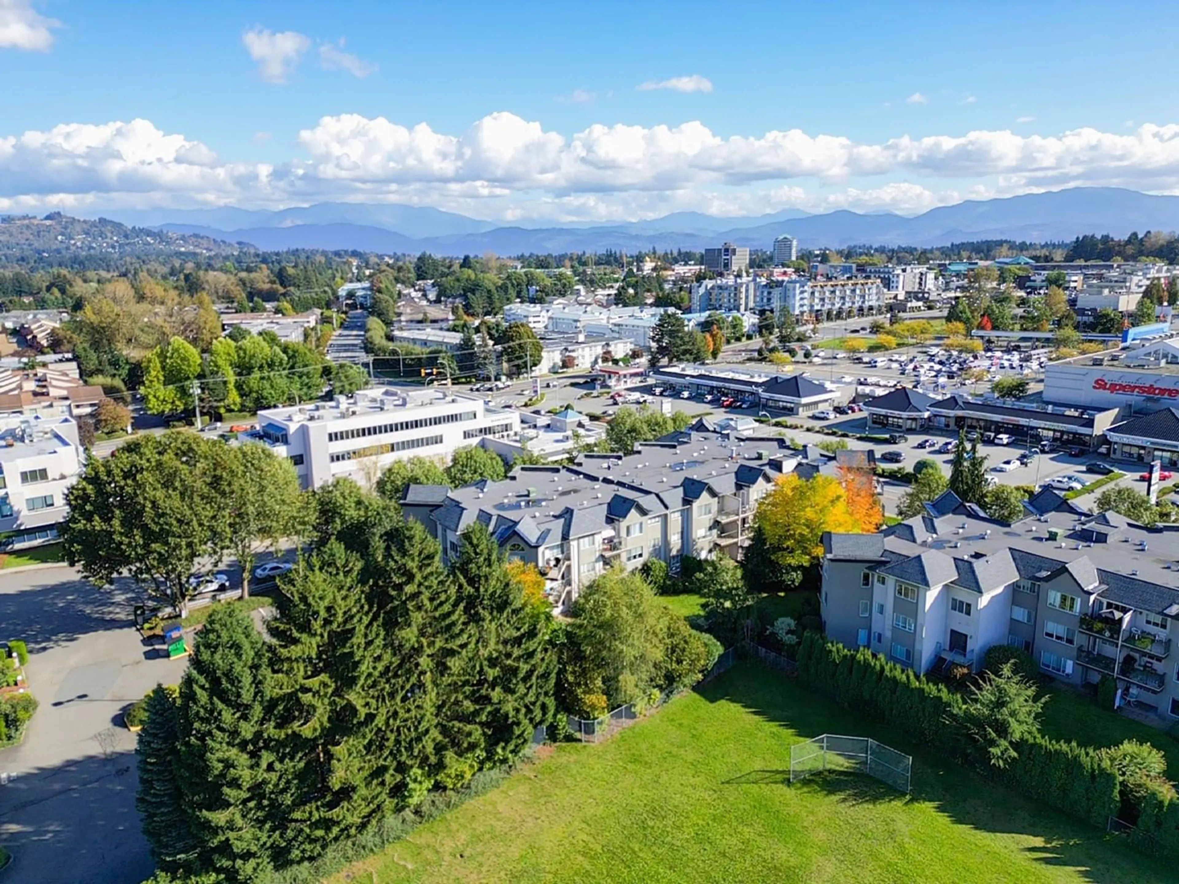 A pic from exterior of the house or condo, the view of city buildings for 102 32725 GEORGE FERGUSON WAY, Abbotsford British Columbia V2T5M5