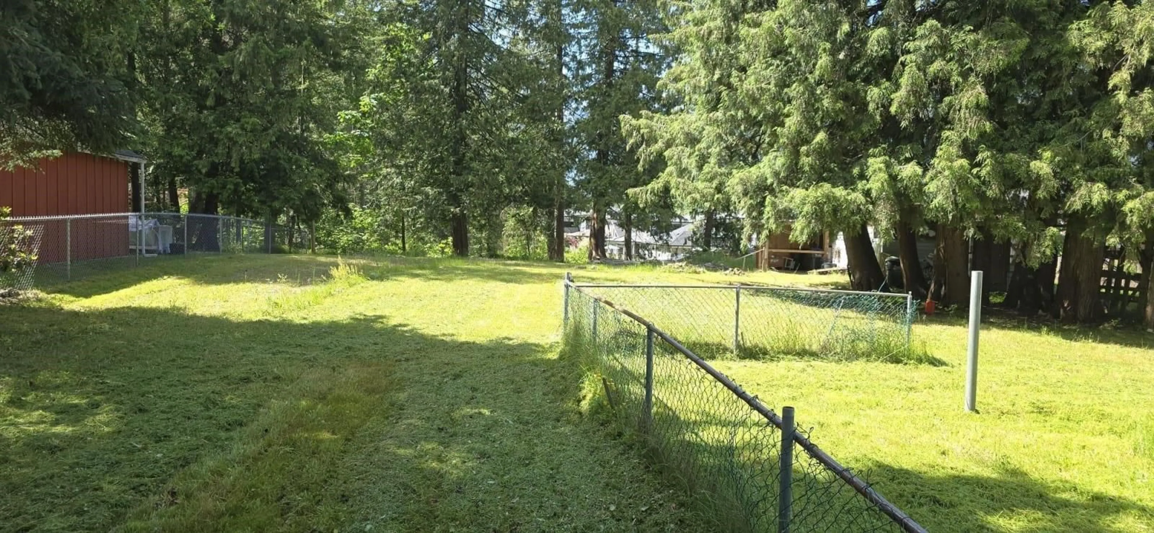 Frontside or backside of a home, the fenced backyard for 19919 SILVERHOPE ROAD, Hope British Columbia V0X1L2