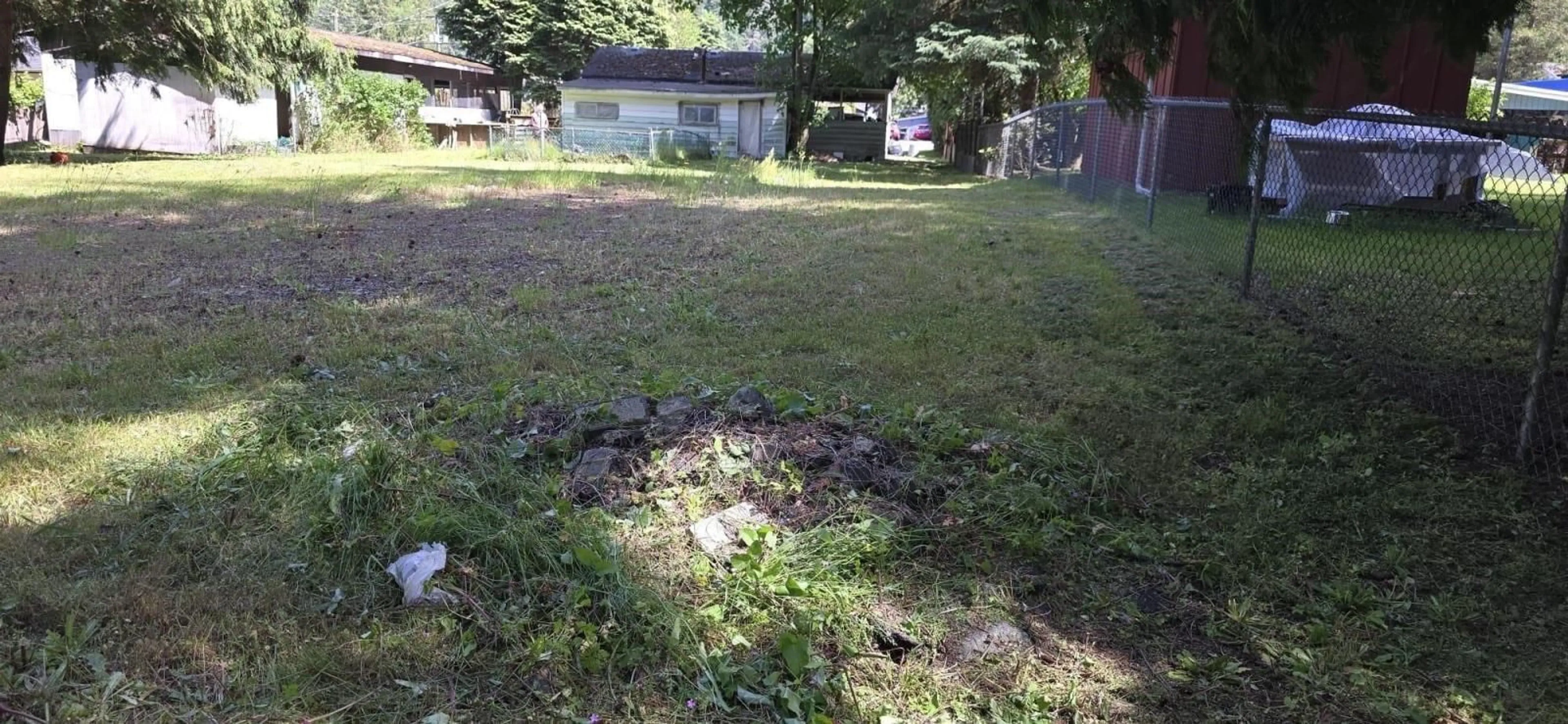 Frontside or backside of a home, the fenced backyard for 19919 SILVERHOPE ROAD, Hope British Columbia V0X1L2