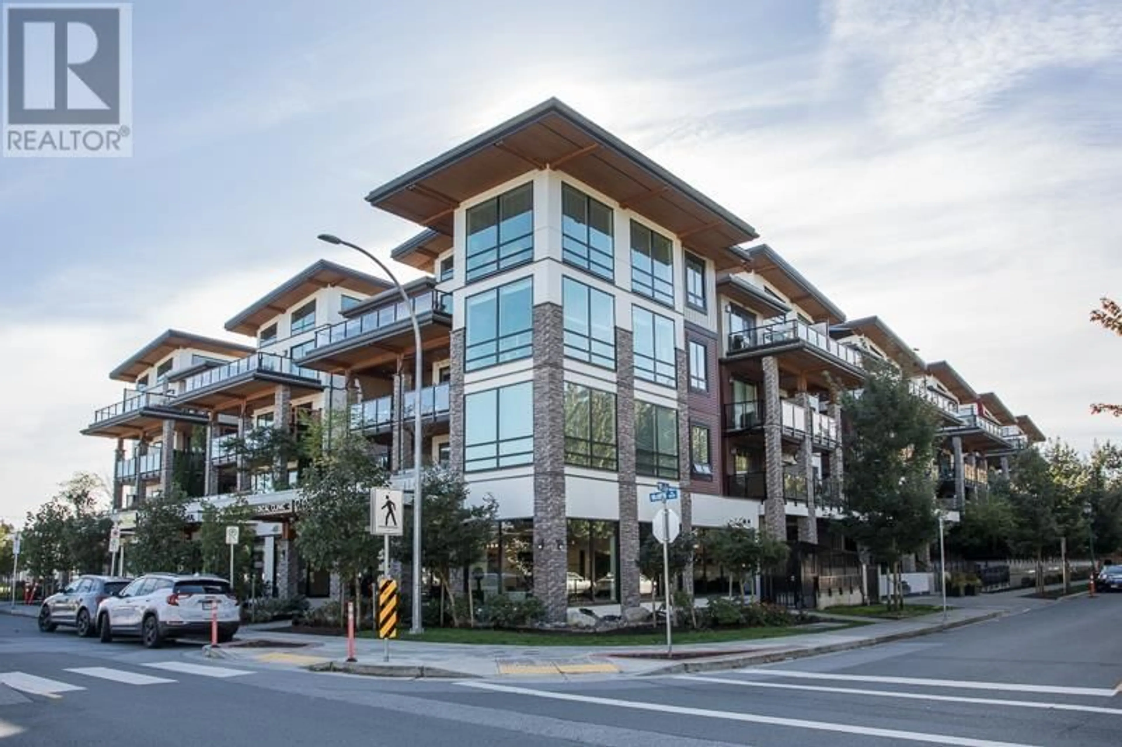 A pic from exterior of the house or condo, the front or back of building for 303 12460 191 STREET, Pitt Meadows British Columbia V3Y2J2