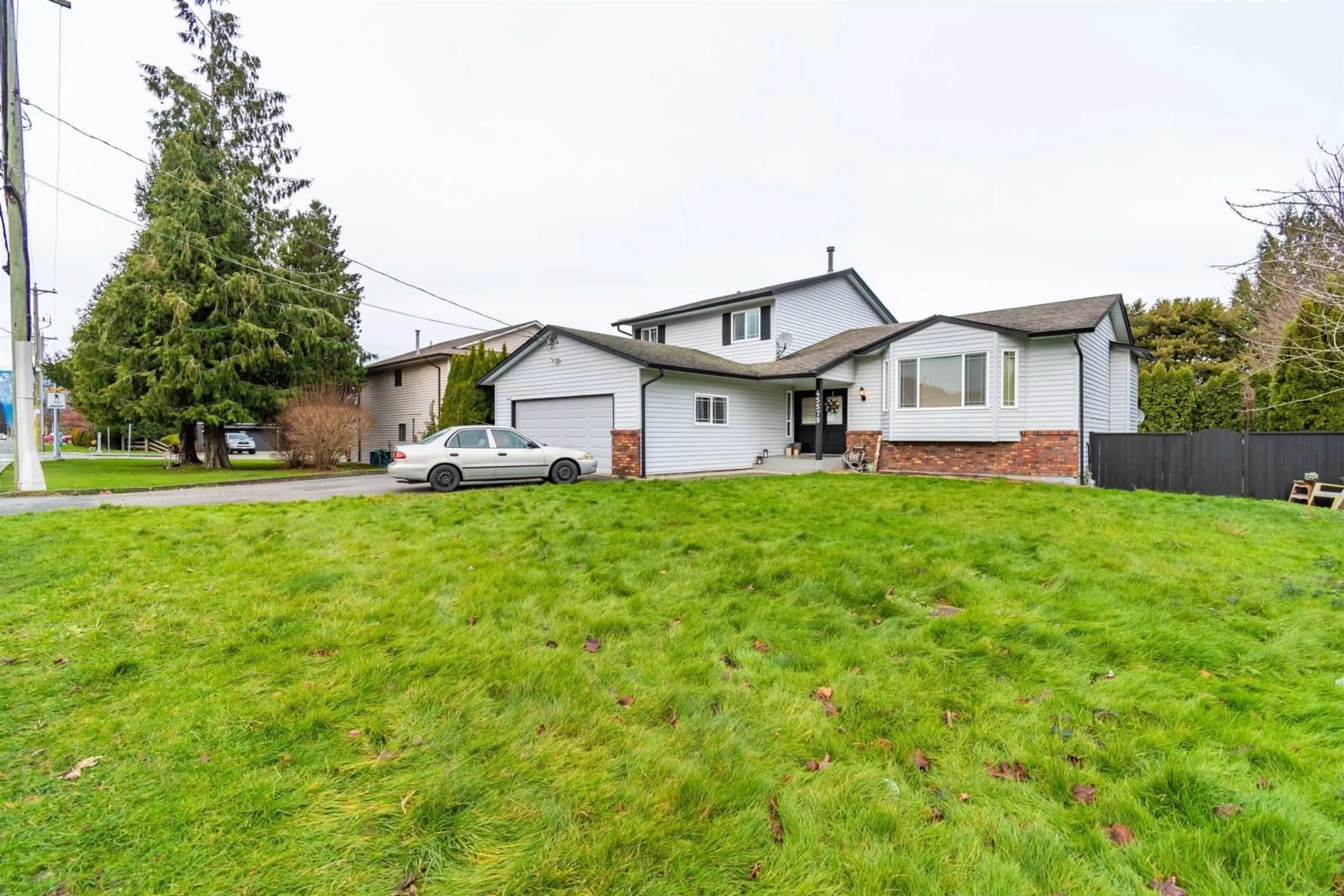 Frontside or backside of a home, the fenced backyard for 45579 STEVENSON ROAD, Chilliwack British Columbia V2R1M6