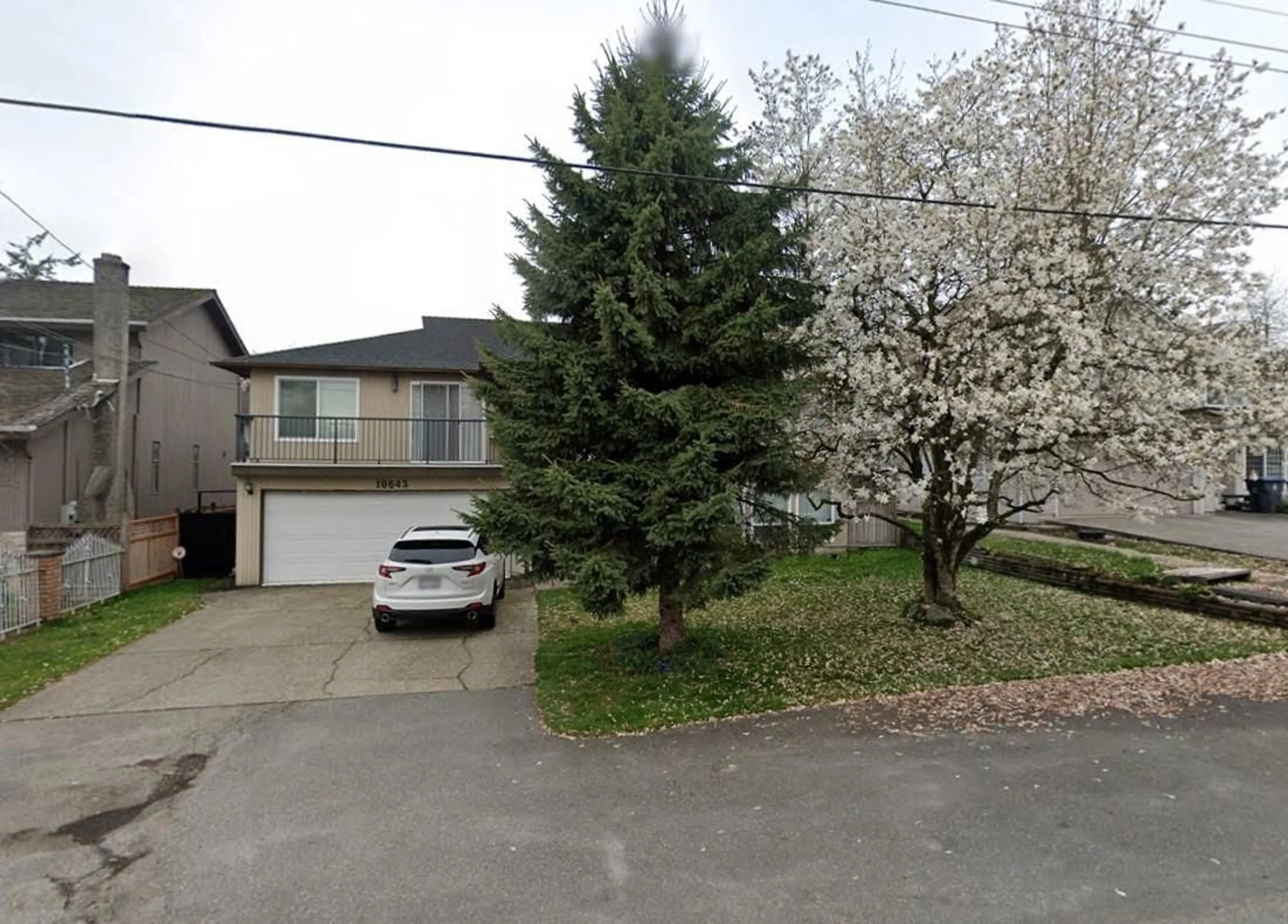 Frontside or backside of a home, the street view for 10643 138A STREET, Surrey British Columbia V3T4L2