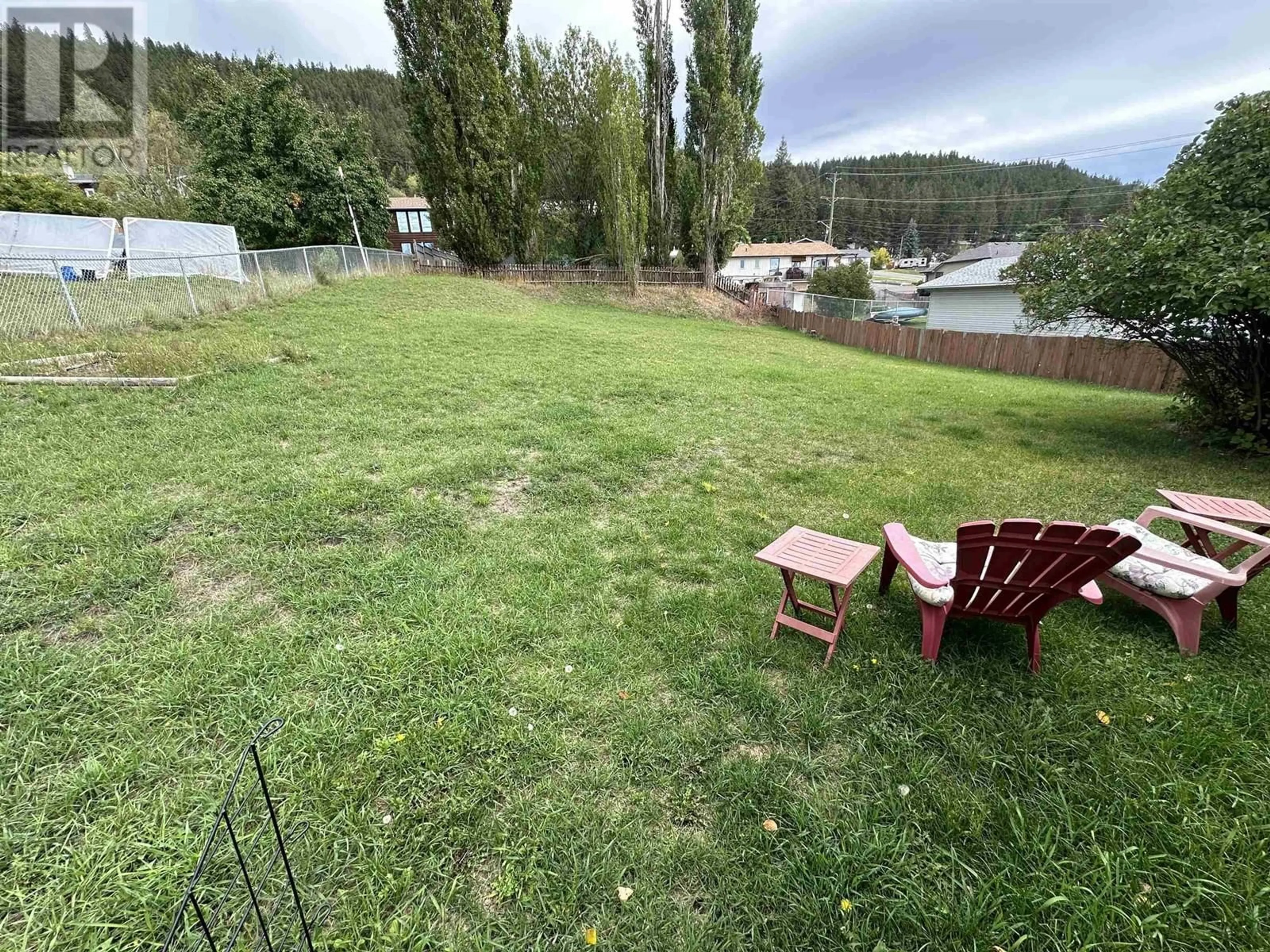 Patio, the fenced backyard for 626 SUNSET DRIVE, Williams Lake British Columbia V2G2Y9