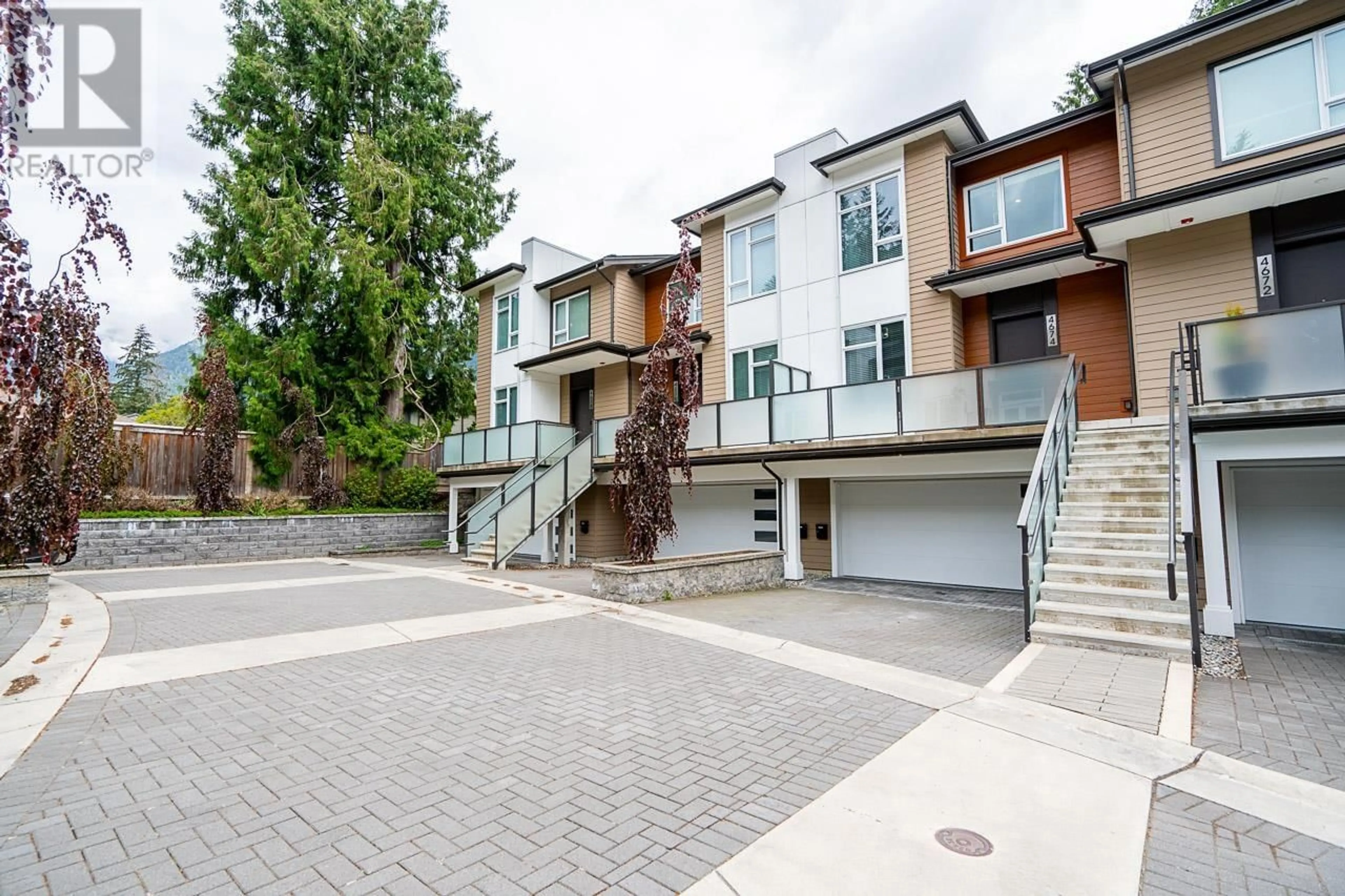 A pic from exterior of the house or condo, the street view for 4674 CAPILANO ROAD, North Vancouver British Columbia V7R4K3