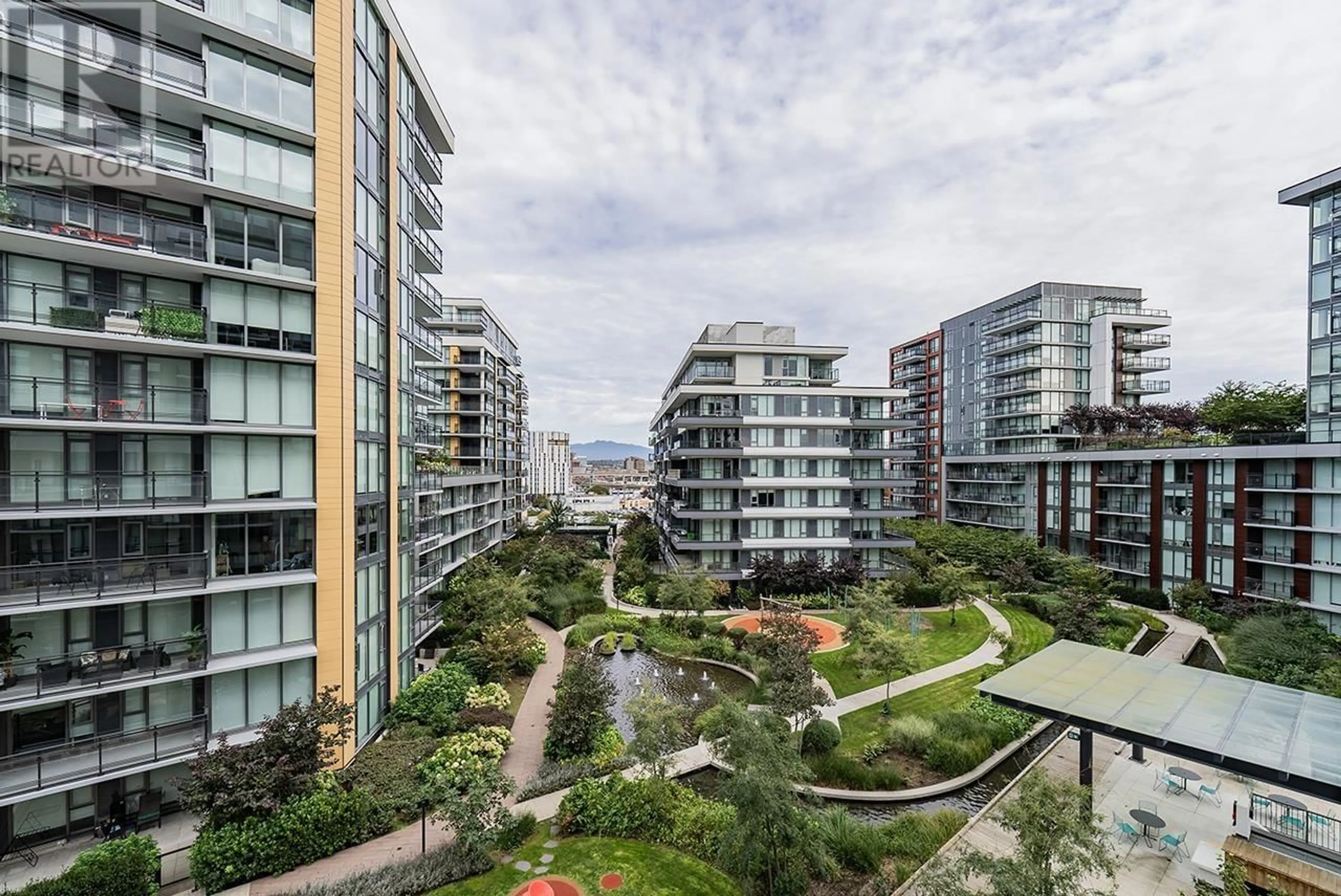 A pic from exterior of the house or condo, the view of city buildings for 910 8155 CAPSTAN WAY, Richmond British Columbia V6X0V3