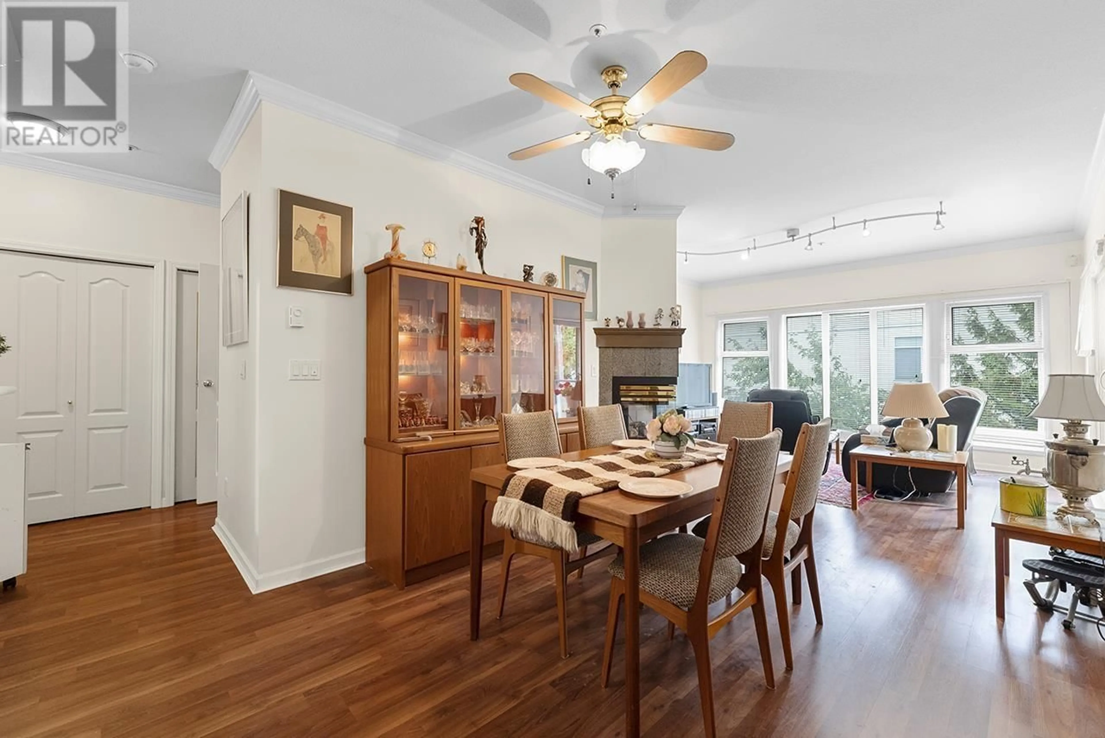 Dining room, wood/laminate floor for 203 8380 JONES ROAD, Richmond British Columbia V6Y1L6