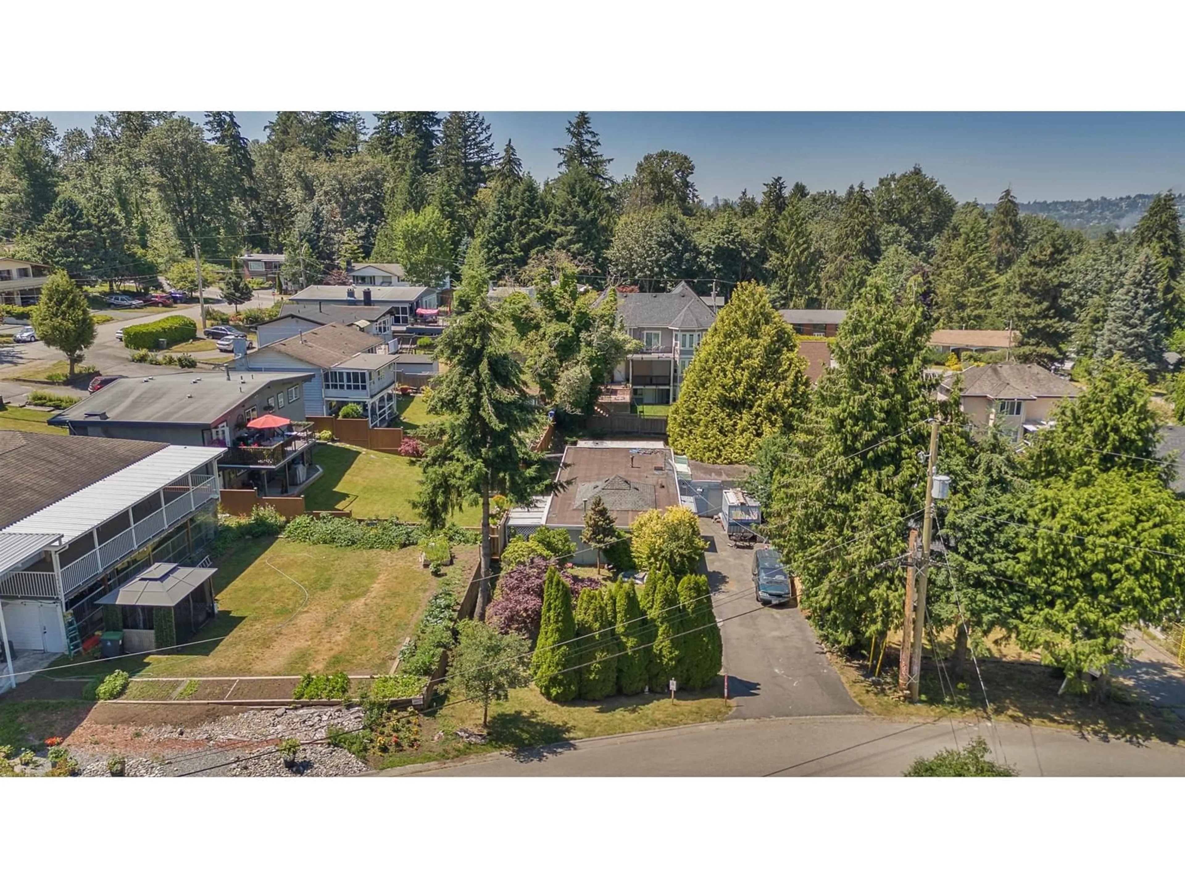 Frontside or backside of a home, the fenced backyard for 11277 134 STREET, Surrey British Columbia V3R2Z2