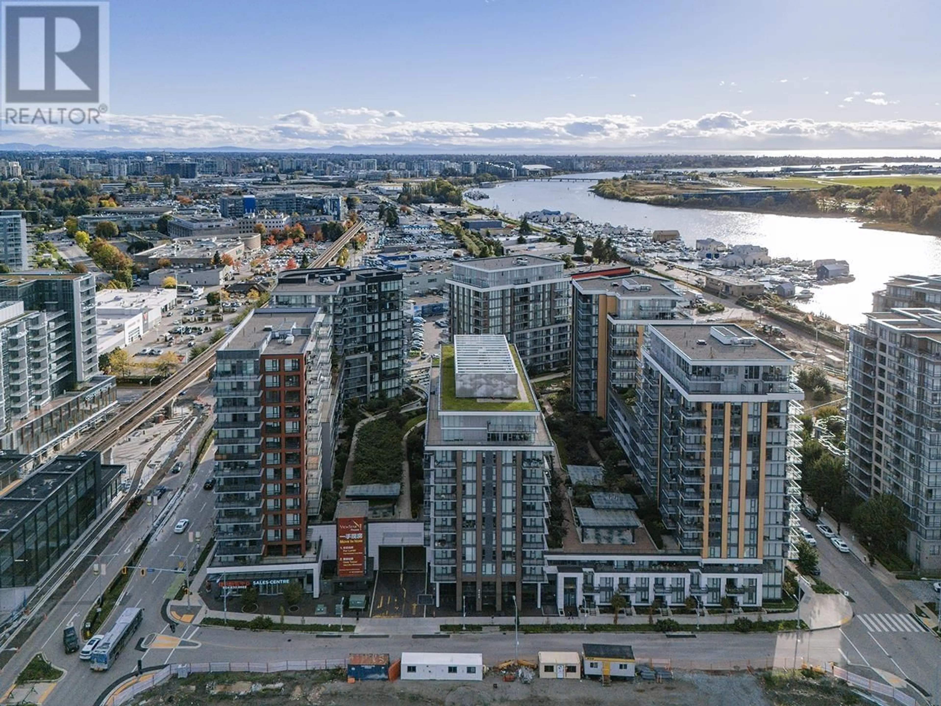 A pic from exterior of the house or condo, the view of city buildings for 1000 3280 CORVETTE WAY, Richmond British Columbia V6X0T9