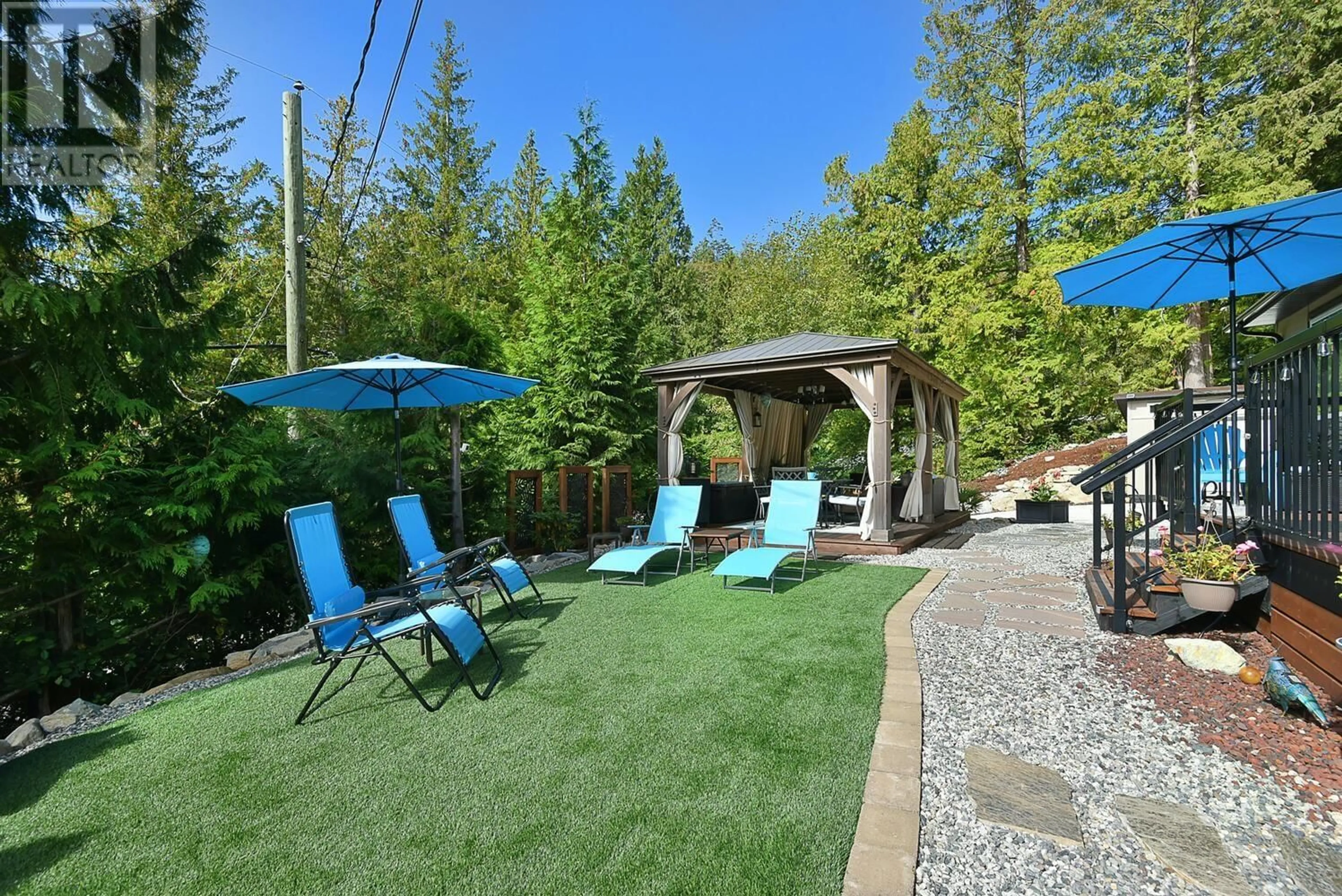 Patio, the fenced backyard for 13470 LEE ROAD, Garden Bay British Columbia V0N1S1