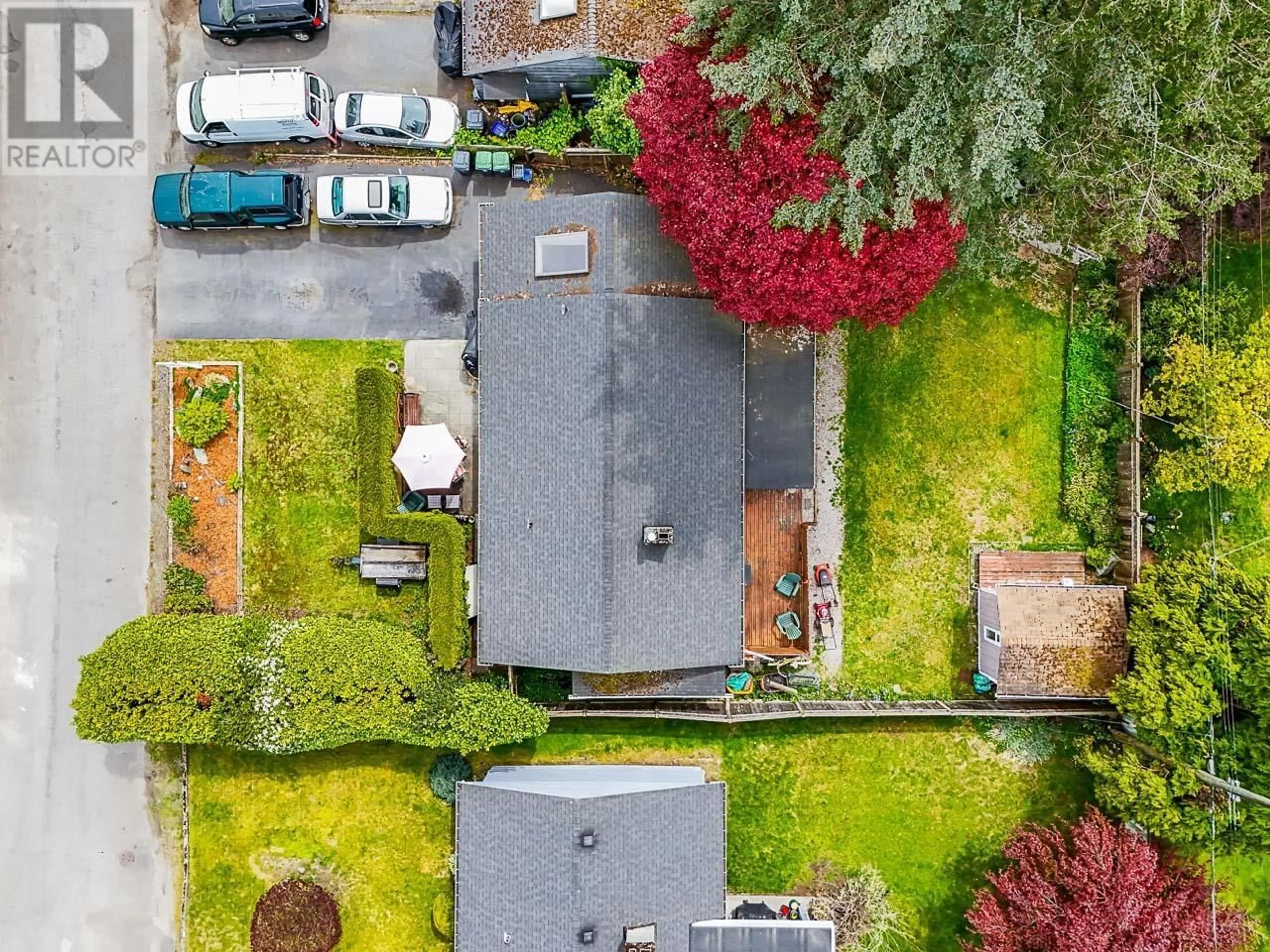 Frontside or backside of a home, the fenced backyard for 1181 SILVERWOOD CRESCENT, North Vancouver British Columbia V7P1J2