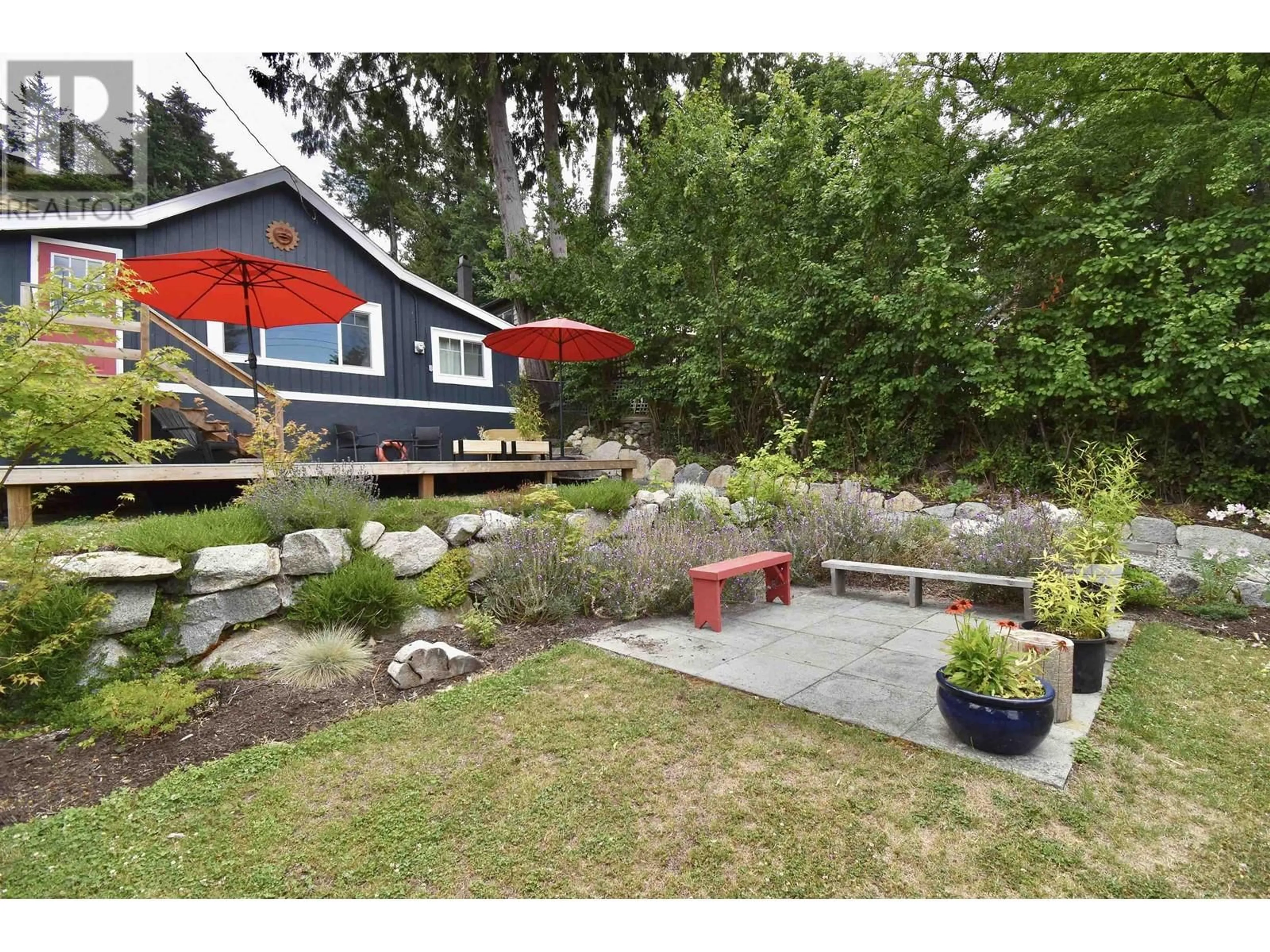 Frontside or backside of a home, the fenced backyard for 350 HEADLANDS ROAD, Gibsons British Columbia V0N1V8