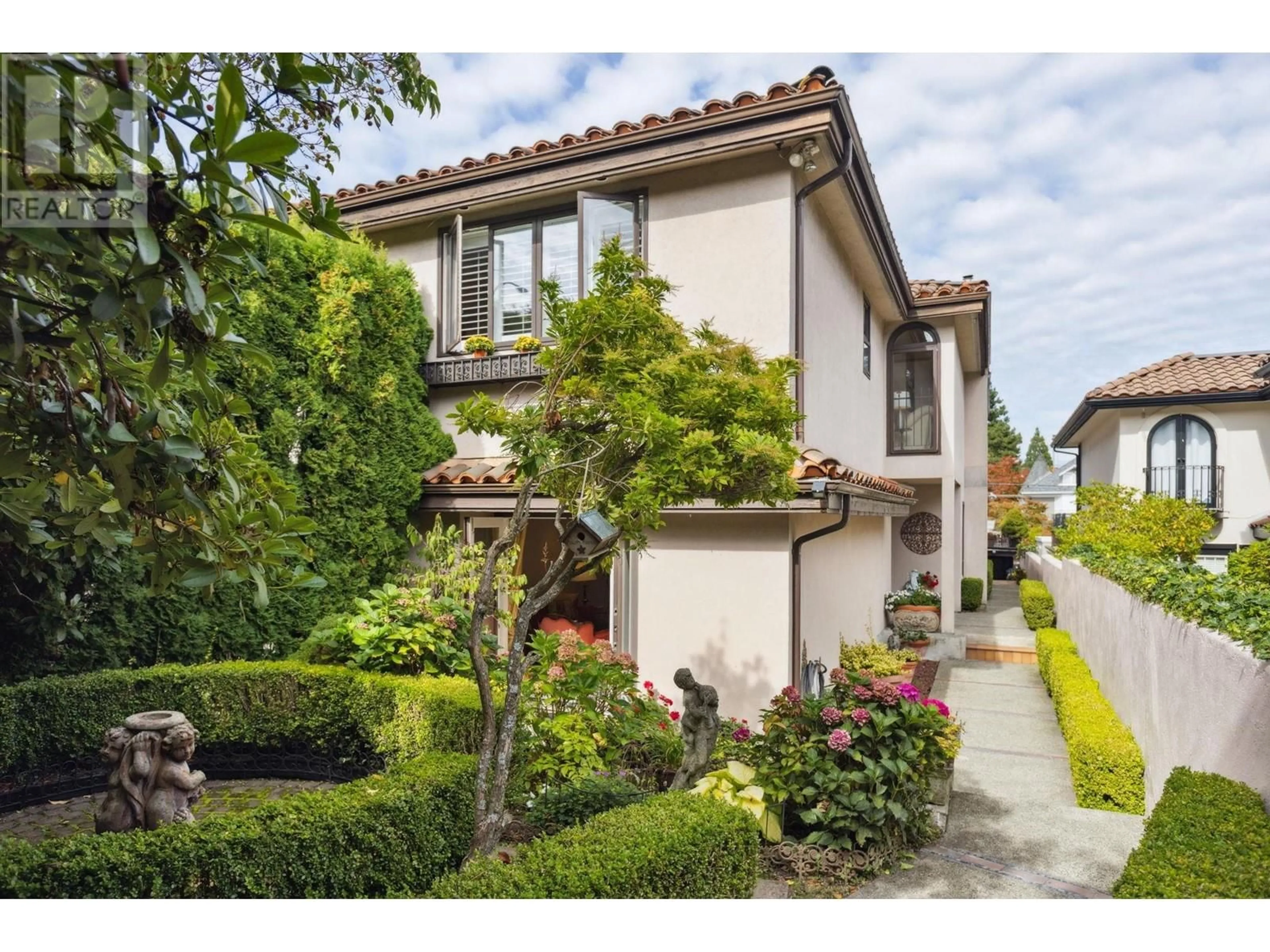 Frontside or backside of a home for 1735 W 16 AVENUE, Vancouver British Columbia V6J2L9