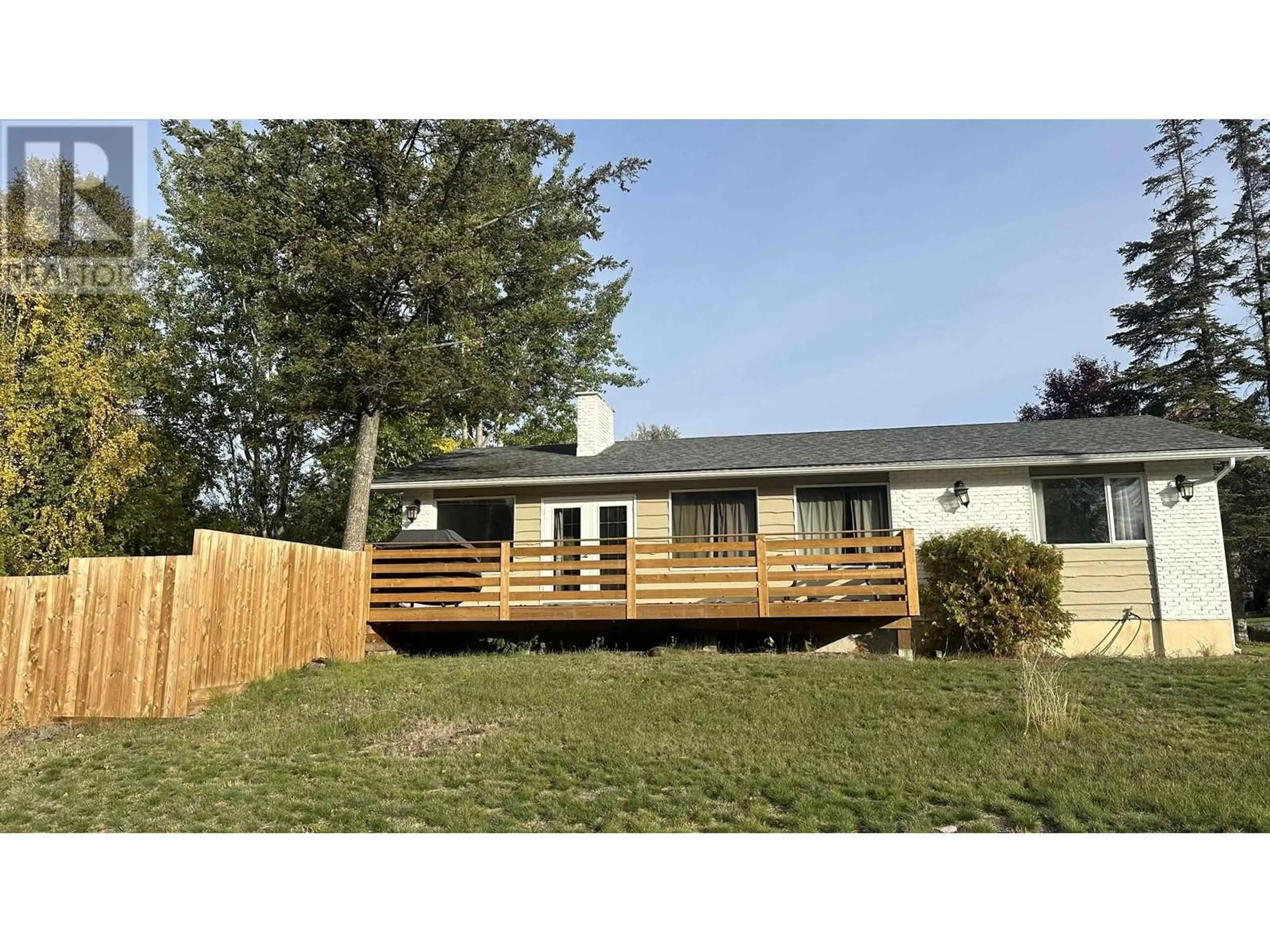 Frontside or backside of a home, the fenced backyard for 5297 CAMBRIDGE ROAD, Prince George British Columbia V2N2B6