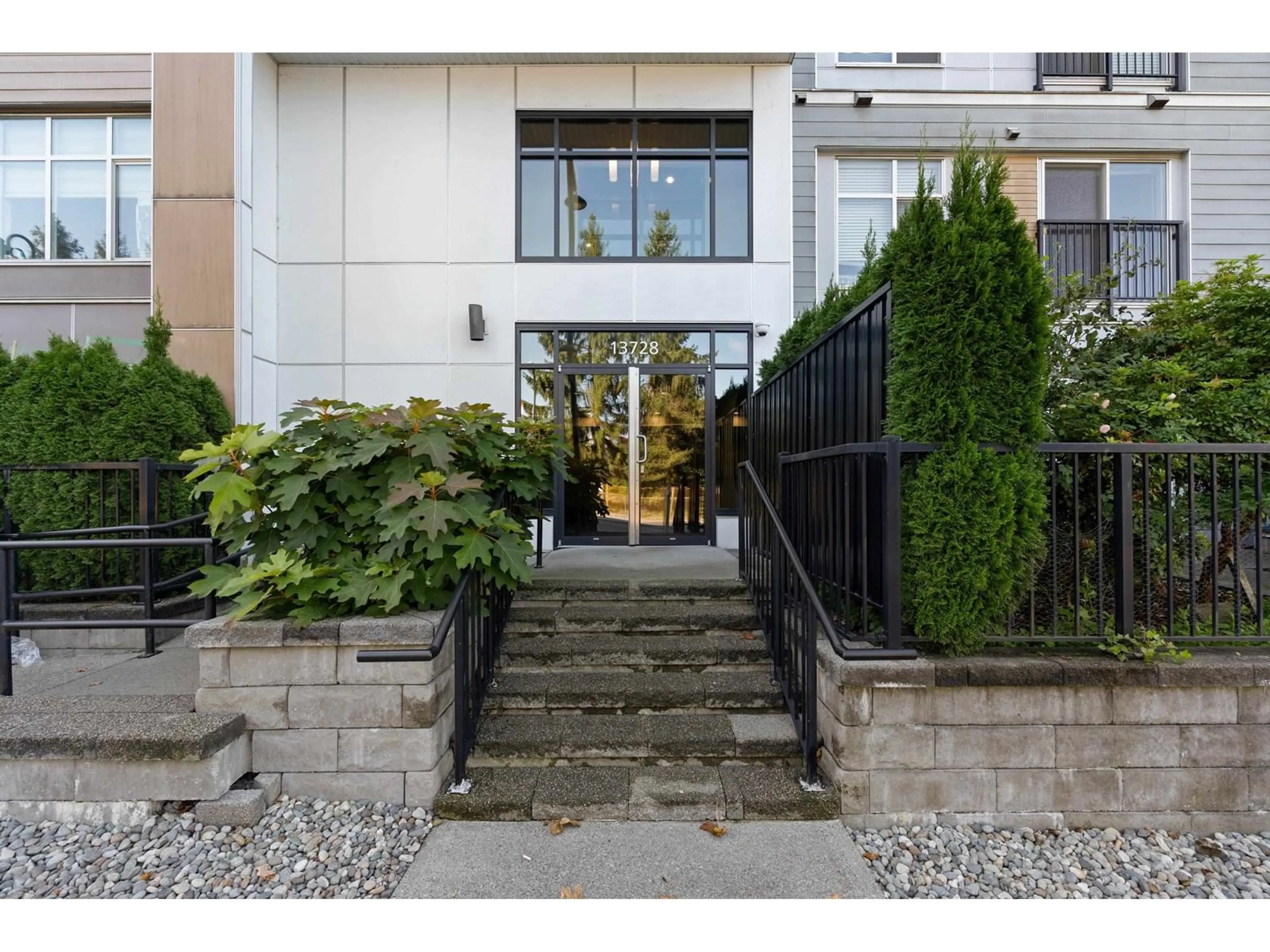 A pic from exterior of the house or condo, the street view for 503 13728 108 AVENUE, Surrey British Columbia V3T0G2