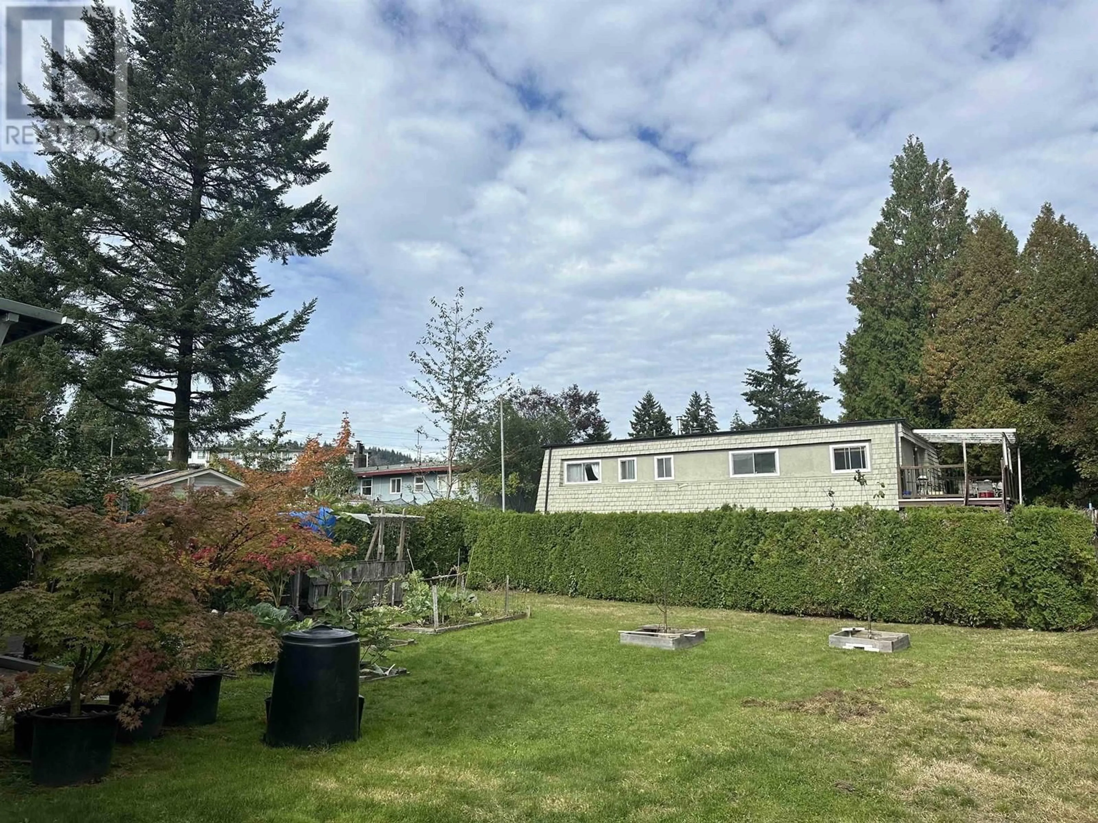 A pic from exterior of the house or condo, the fenced backyard for 751 EGMONT AVENUE, Coquitlam British Columbia V3J4J7