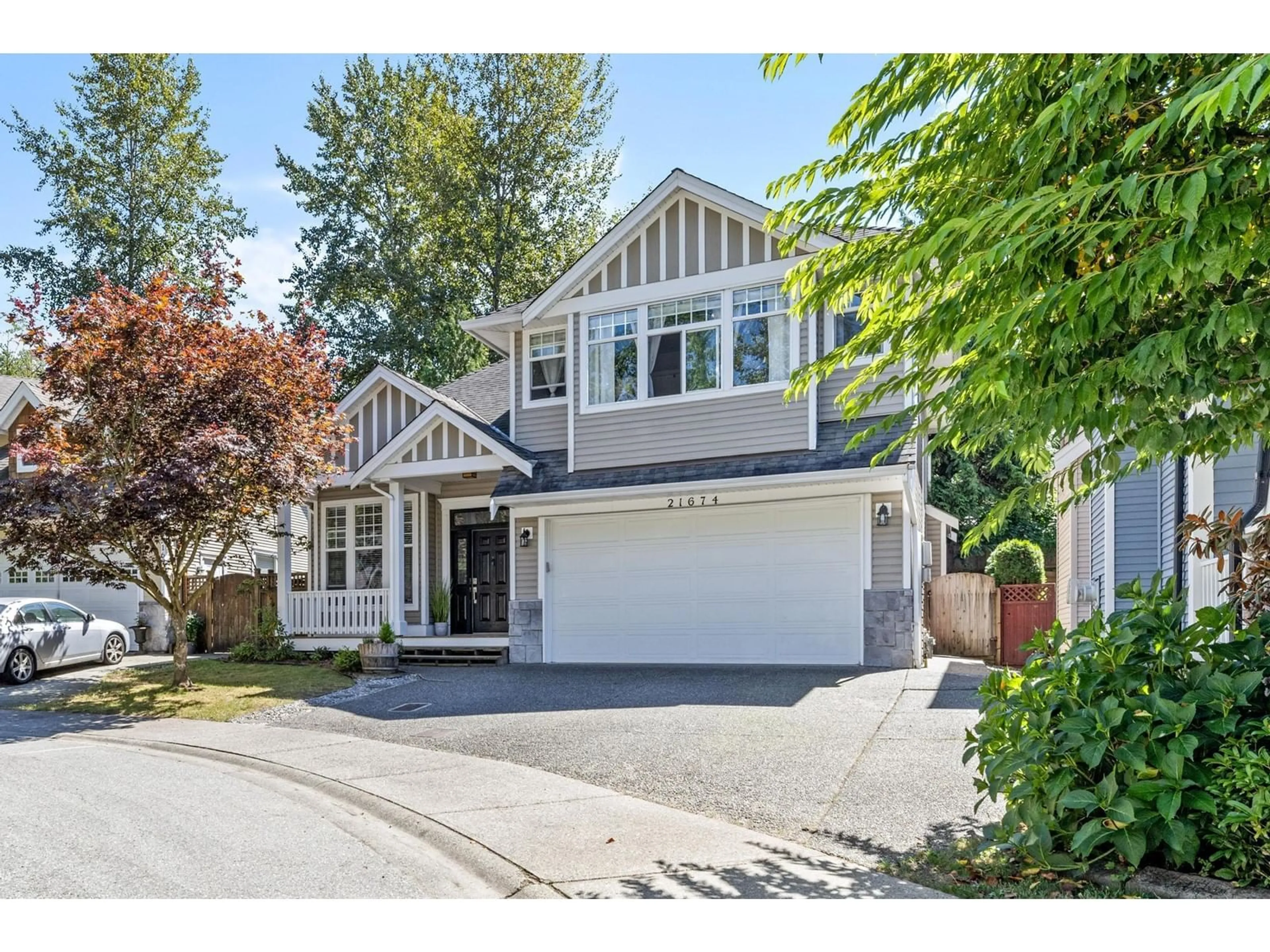 Frontside or backside of a home, the street view for 21674 93 AVENUE, Langley British Columbia V1M4E1