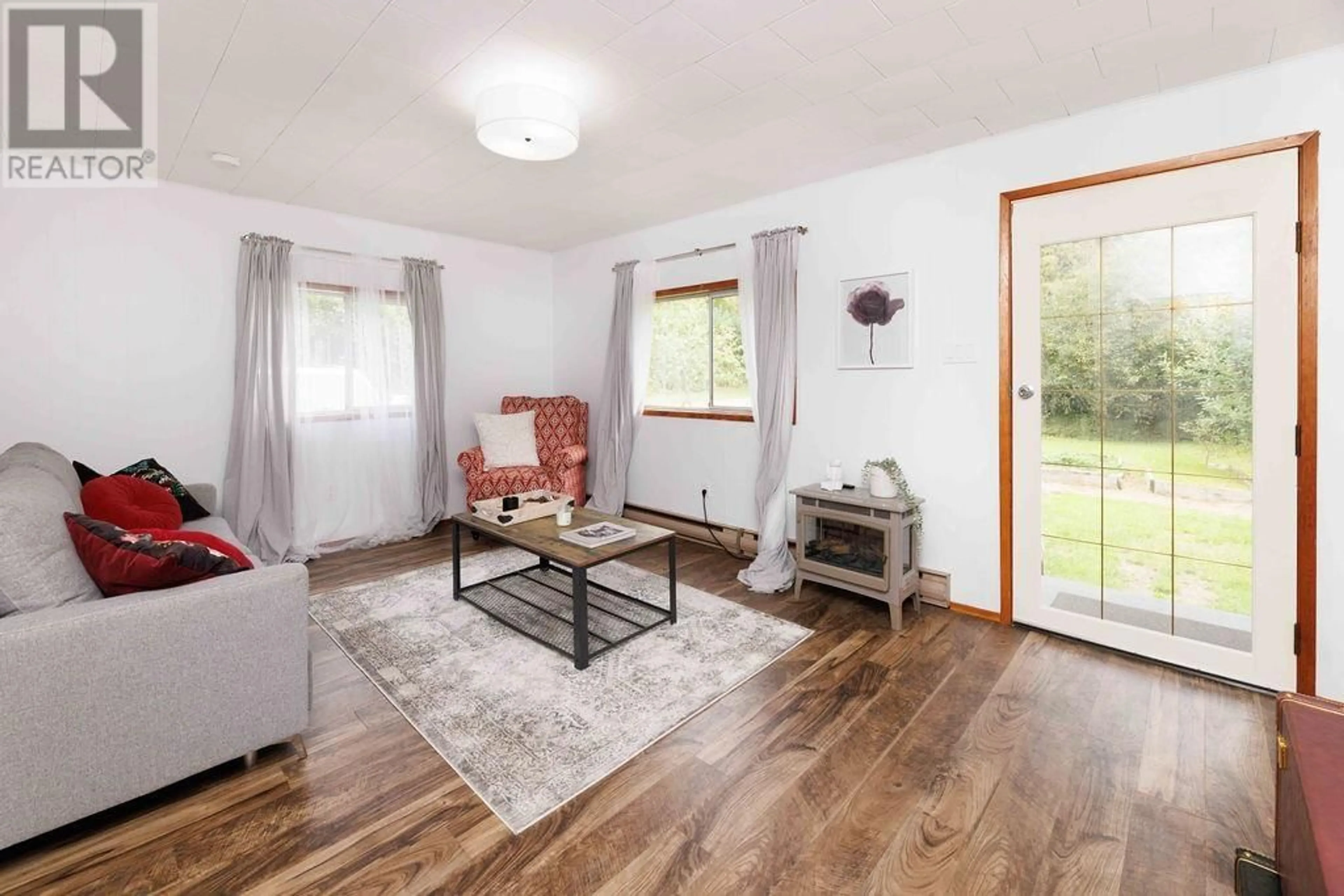 Living room, wood floors for 1225 ROBERTS CREEK ROAD, Roberts Creek British Columbia V0N2W2