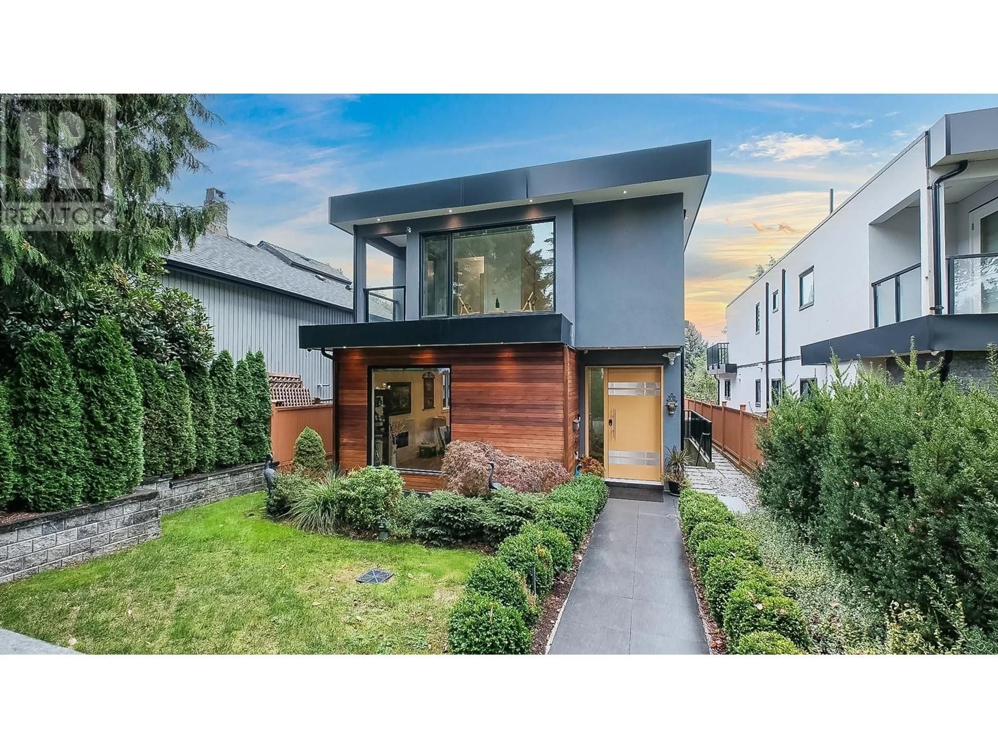 Frontside or backside of a home, the fenced backyard for 543 W 21ST STREET, North Vancouver British Columbia V7M1Z8