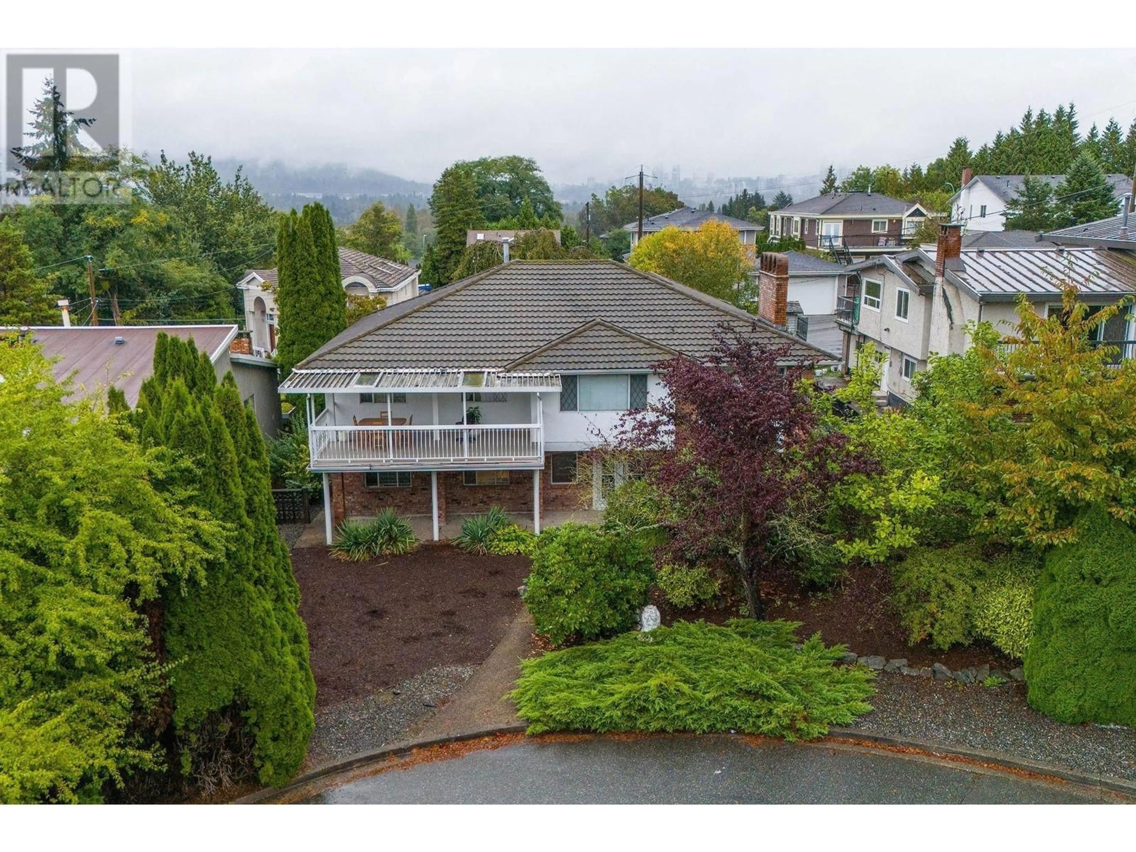 Frontside or backside of a home, the fenced backyard for 6130 BUCKINGHAM PLACE, Burnaby British Columbia V5E3W5