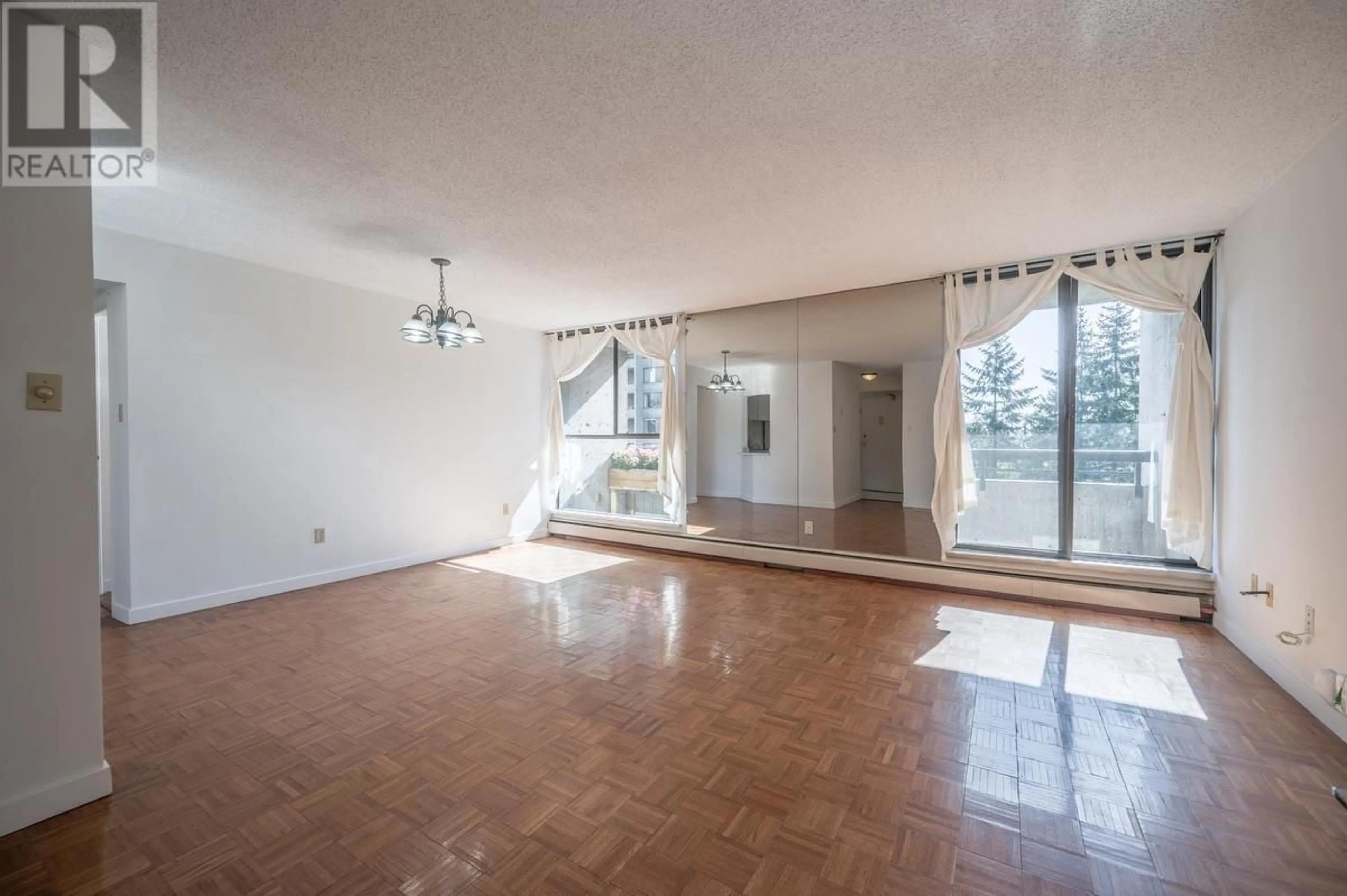 A pic of a room, wood floors for 604 3755 BARTLETT COURT, Burnaby British Columbia V3J7G7