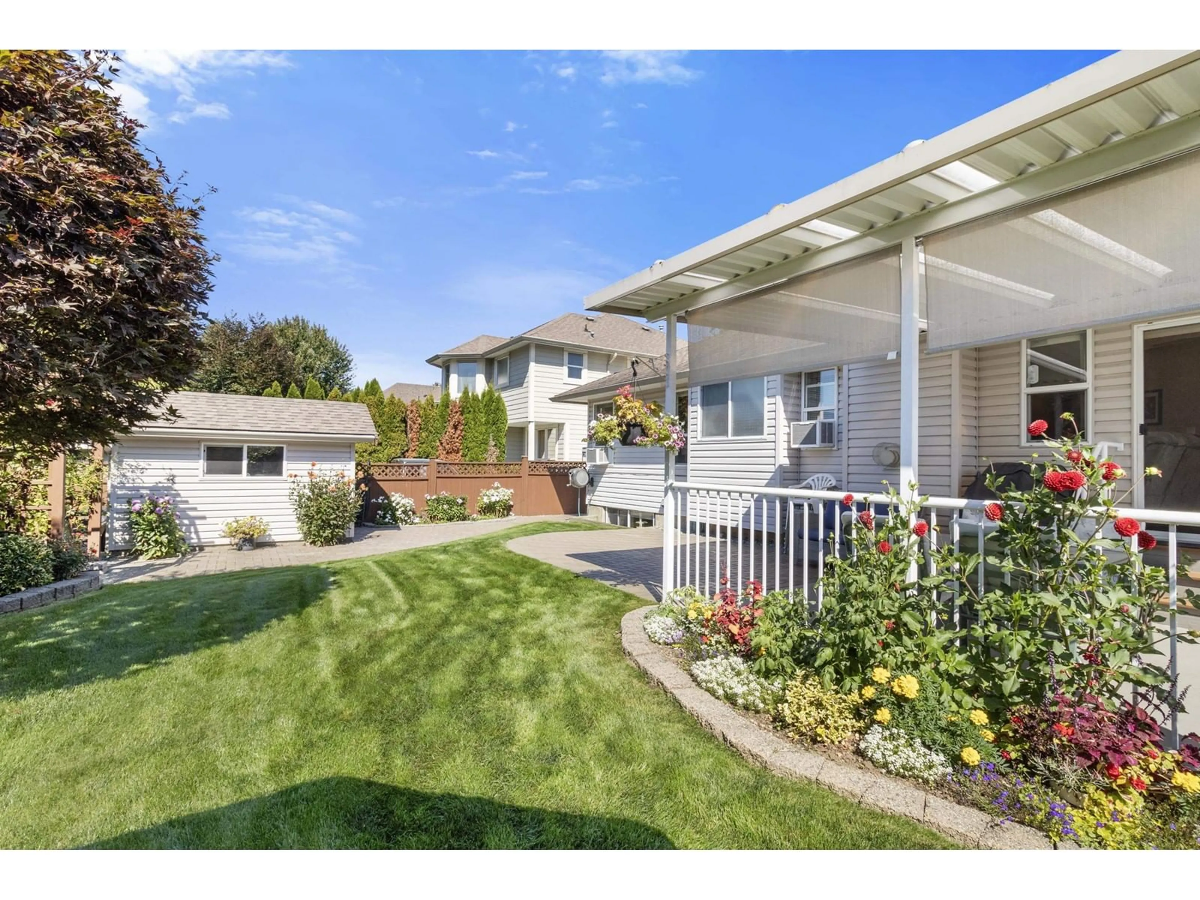 Frontside or backside of a home, the fenced backyard for 2965 WHISTLE DRIVE, Abbotsford British Columbia V4X2R8