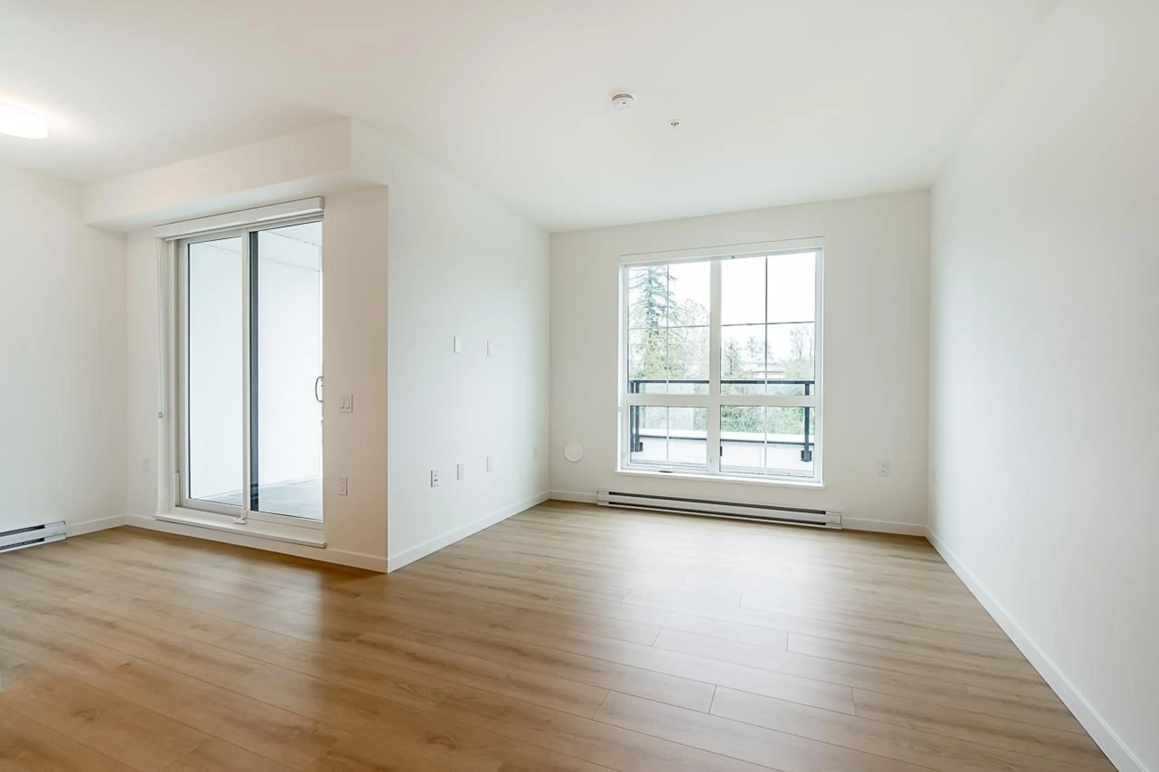 A pic of a room, wood floors for B505 20078 85 AVENUE, Langley British Columbia V1M2L4