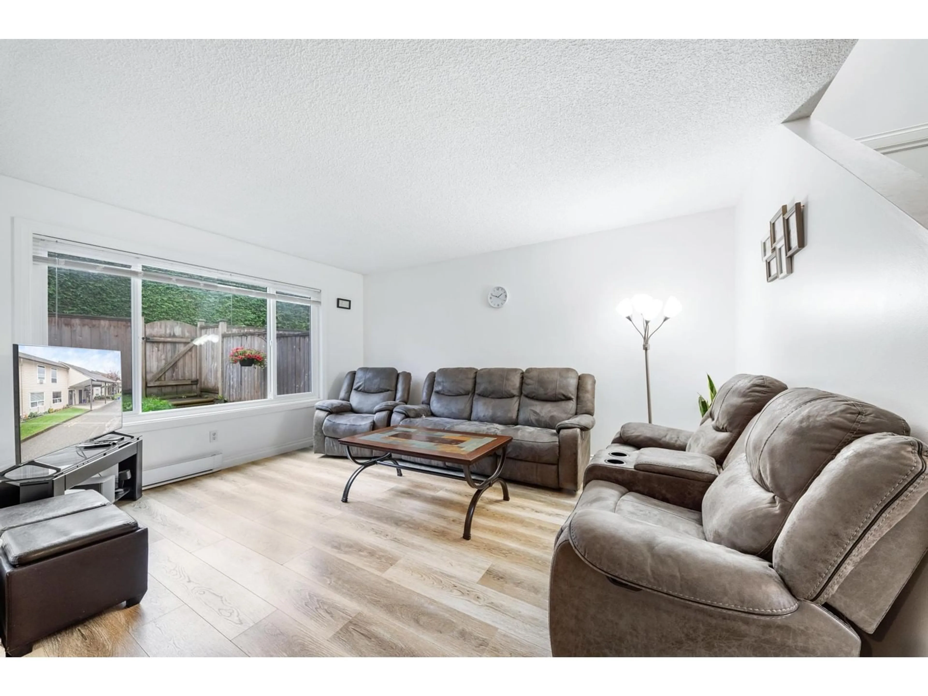 Living room, wood floors for 303 27411 28 AVENUE, Langley British Columbia V4W3V2